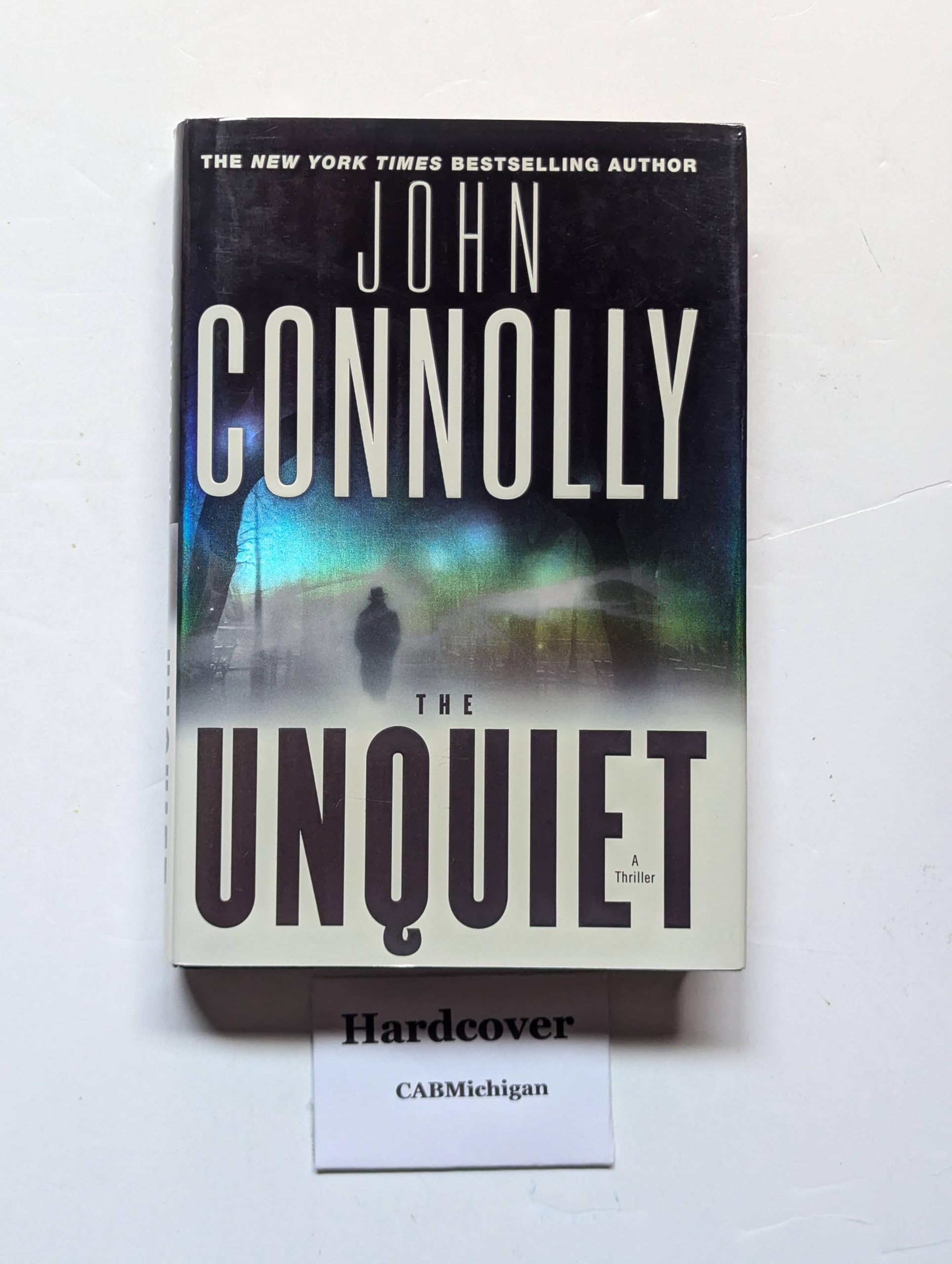 The Unquiet: A Thriller (Charlie Parker Thrillers) used book depot