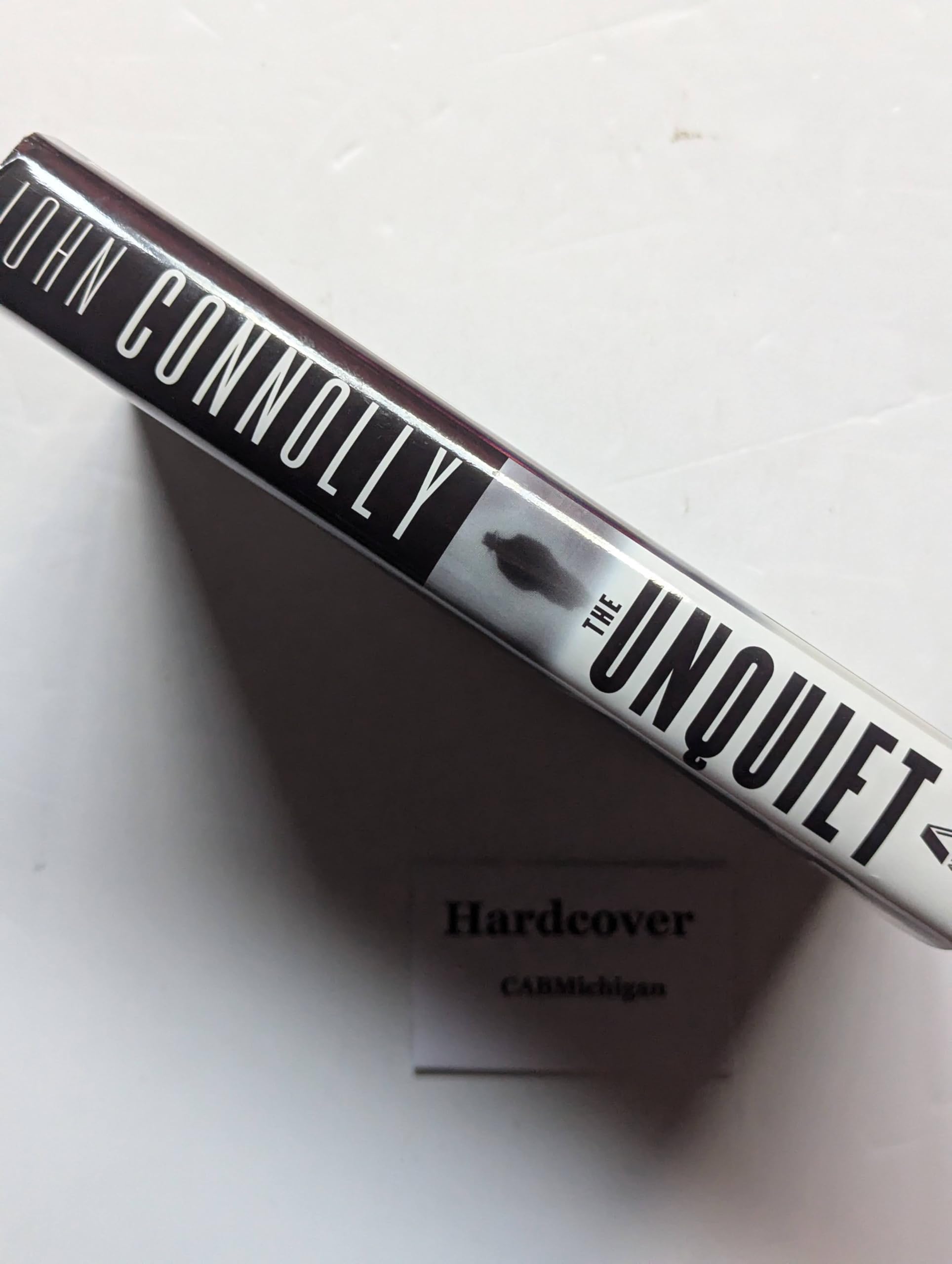 The Unquiet: A Thriller (Charlie Parker Thrillers) used book depot