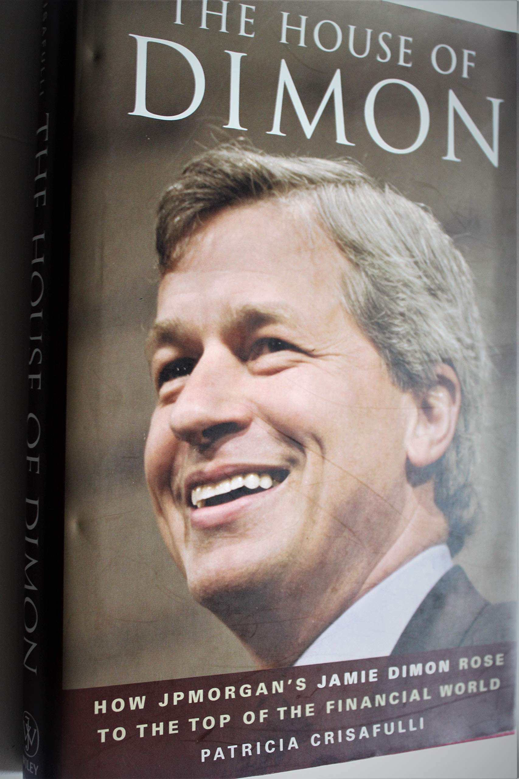 The House of Dimon: How JPMorgan's Jamie Dimon Rose to the Top of the Financial World used book depot