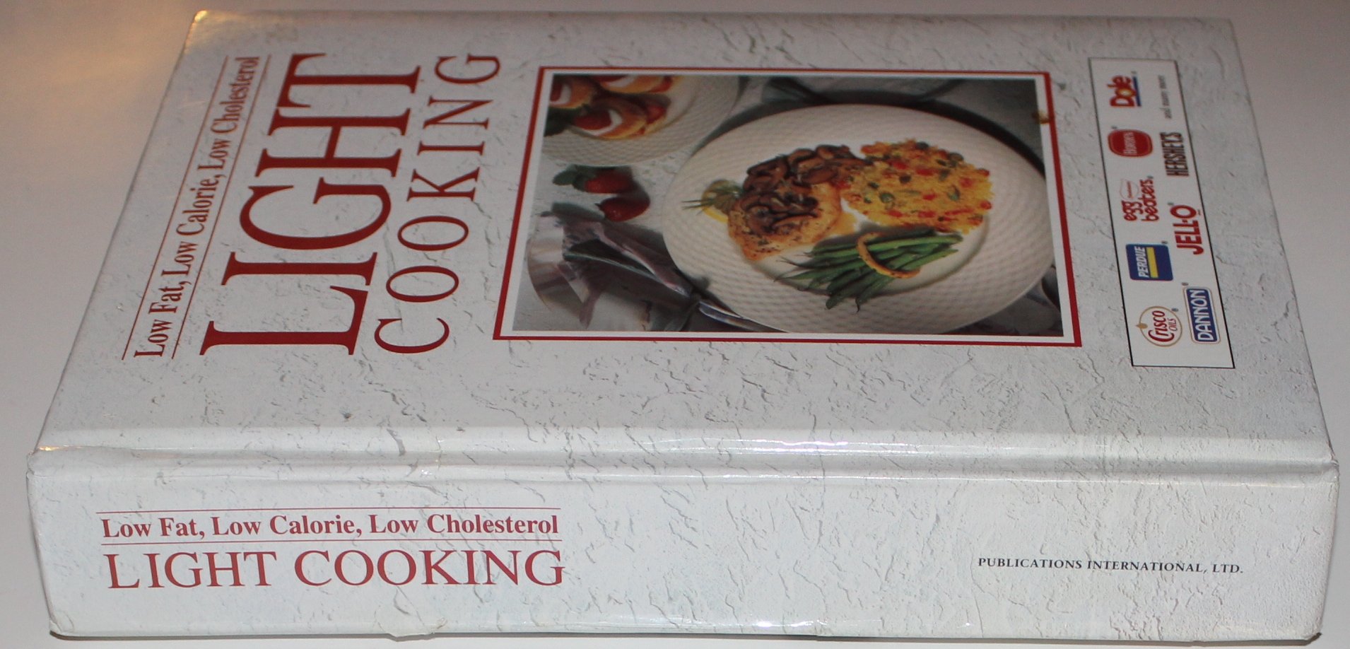LIGHT COOKING/LOW FAT CALORIE CHOLESTEROL by Ltd Publications Intl ed (1994) Hardcover used book depot