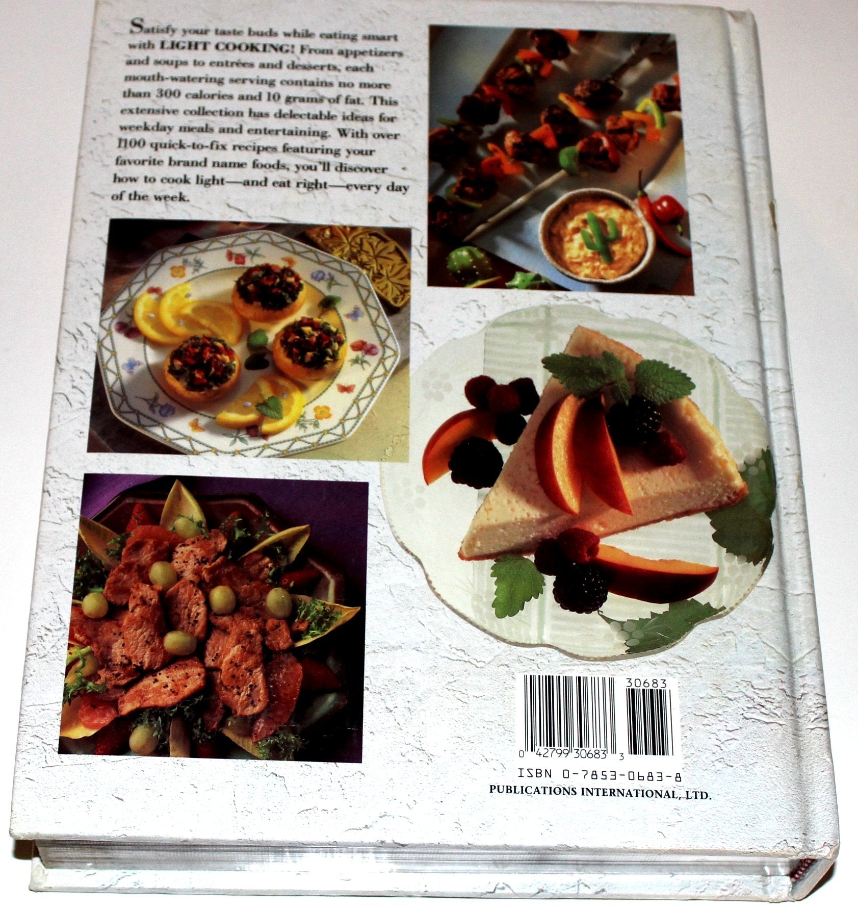 LIGHT COOKING/LOW FAT CALORIE CHOLESTEROL by Ltd Publications Intl ed (1994) Hardcover used book depot