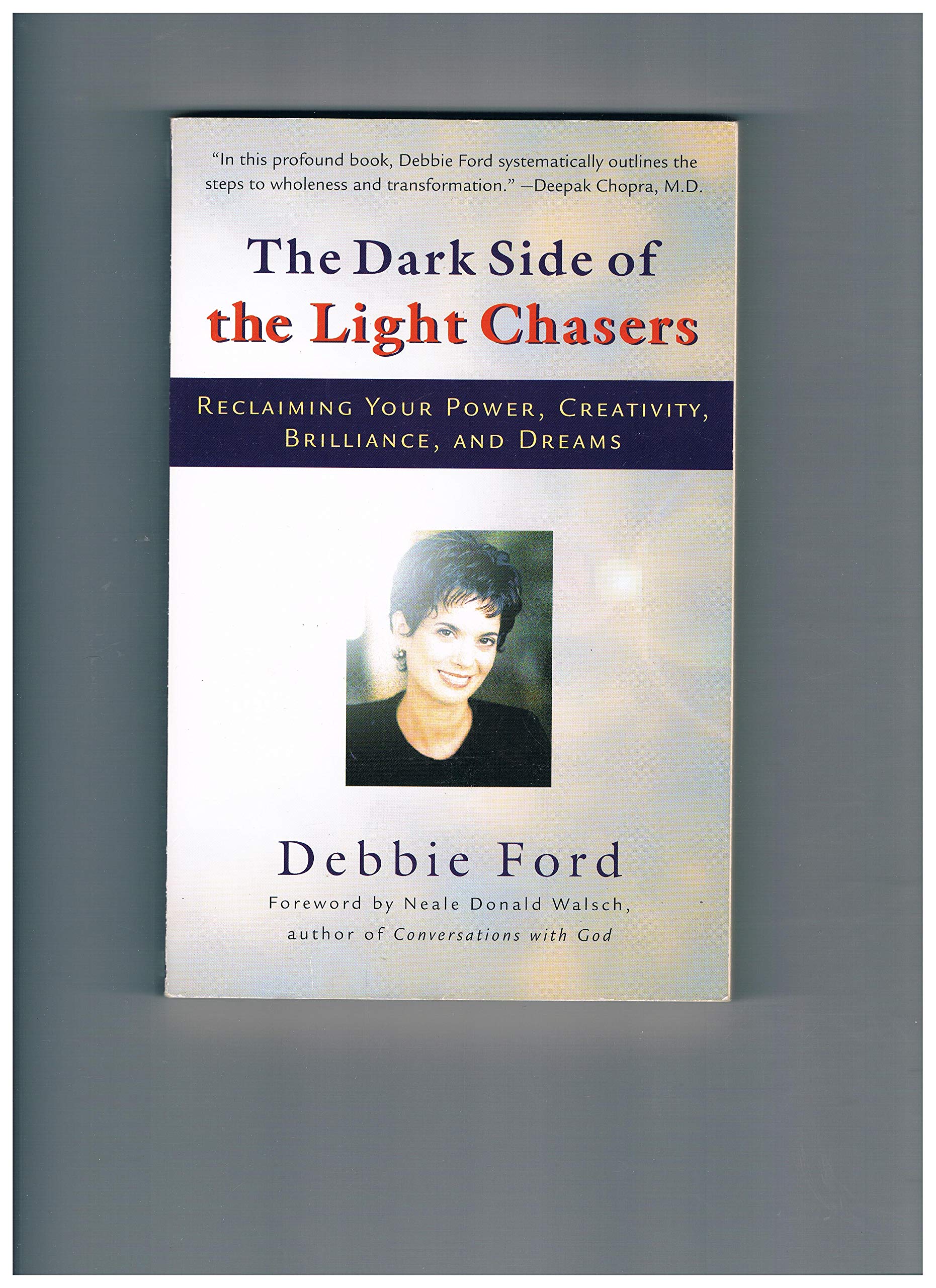 The Dark Side of the Light Chasers: Reclaiming Your Power, Creativity, Brilliance, and Dreams used book depot