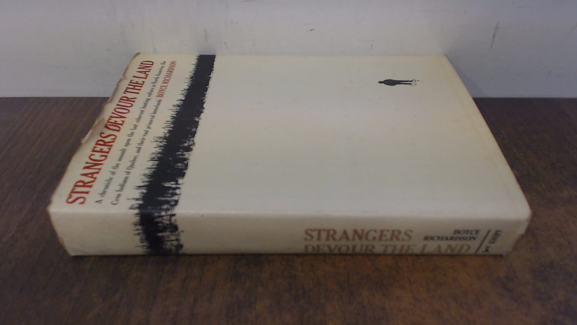 Strangers devour the land: A chronicle of the assault upon the last coherent hunting culture in North America, the Cree Indians of northern Quebec, and their vast primeval homelands used book depot