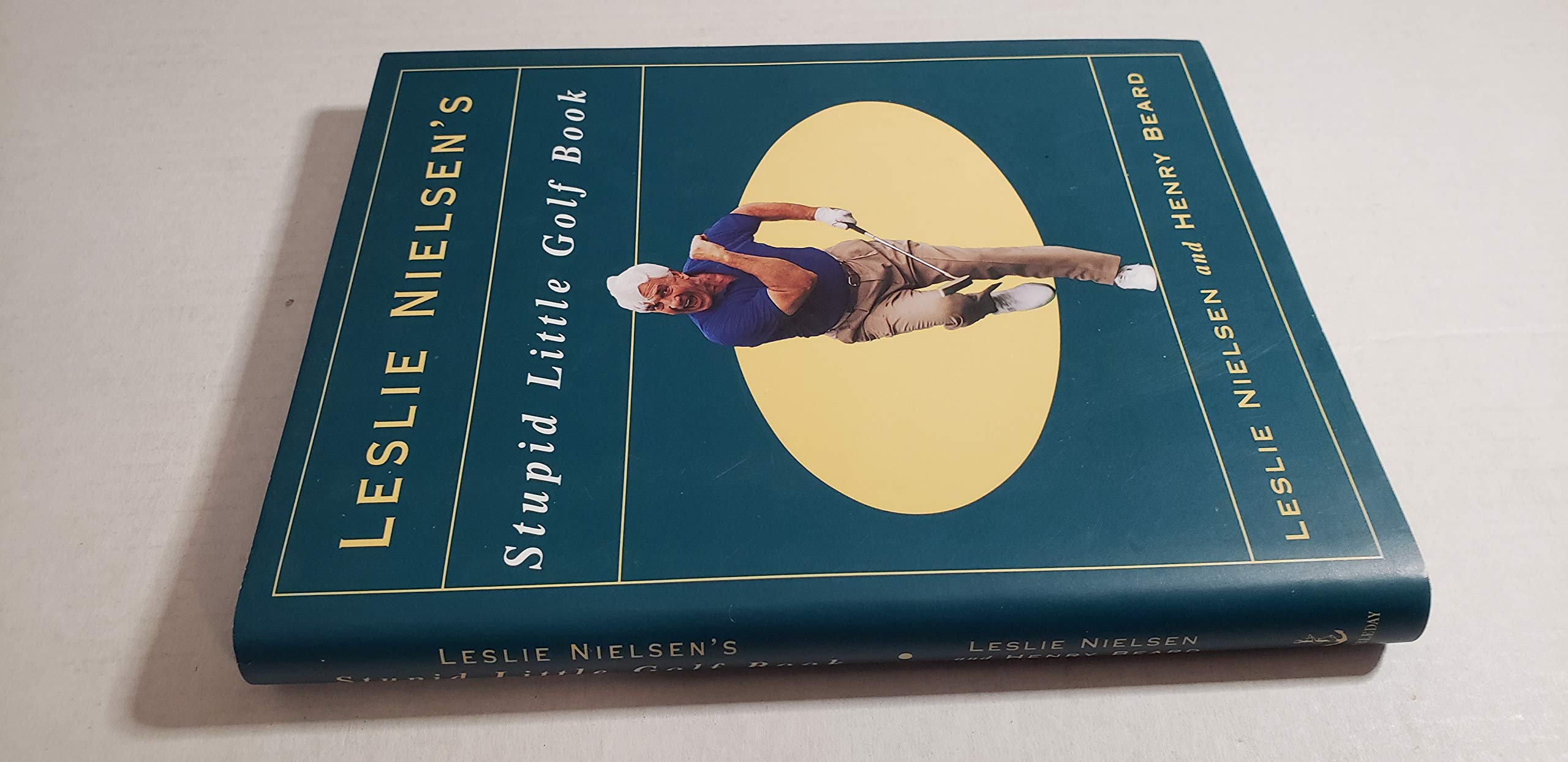 Leslie Nielson's Stupid Little Golf Book used book depot