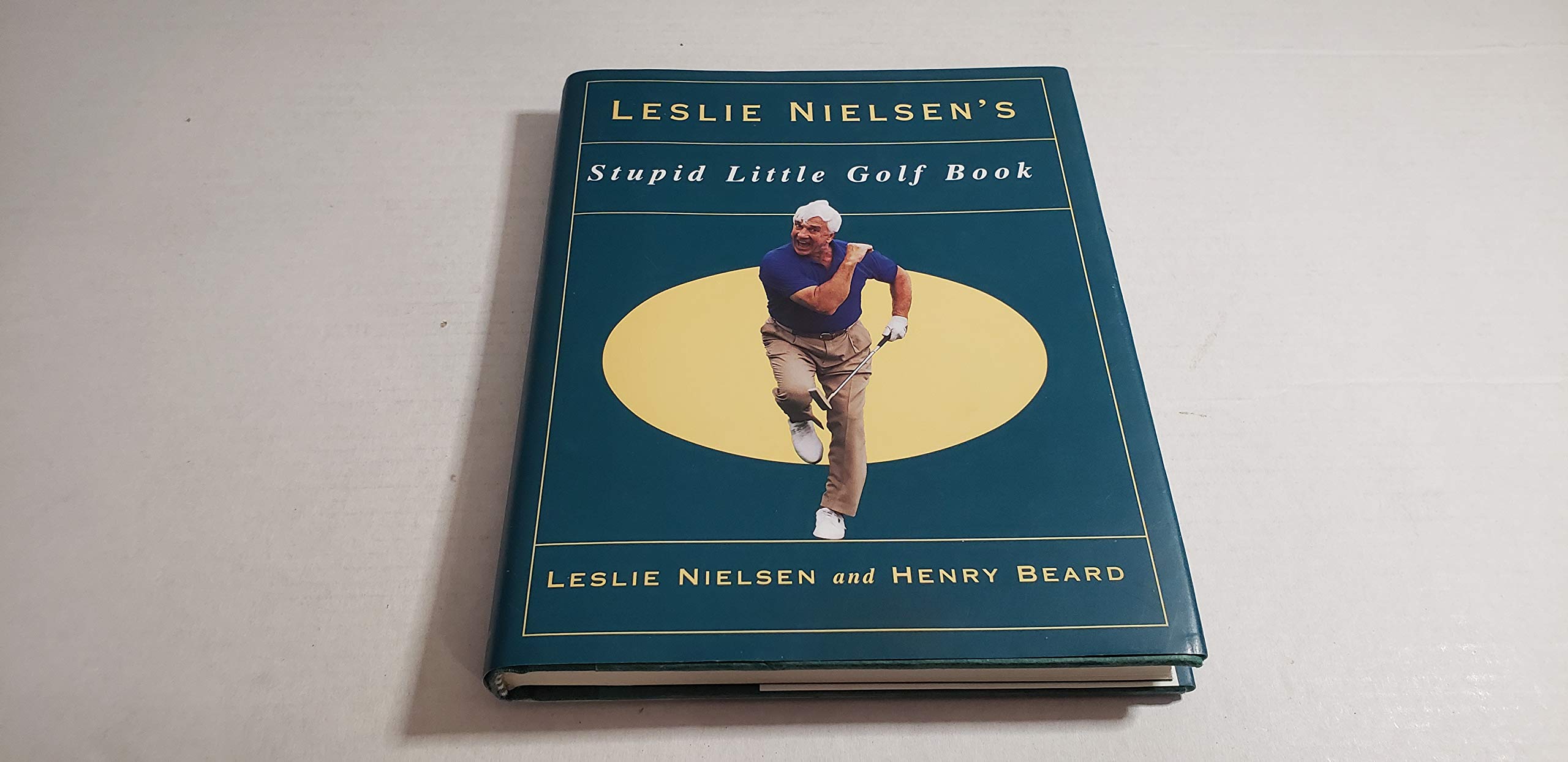 Leslie Nielson's Stupid Little Golf Book used book depot