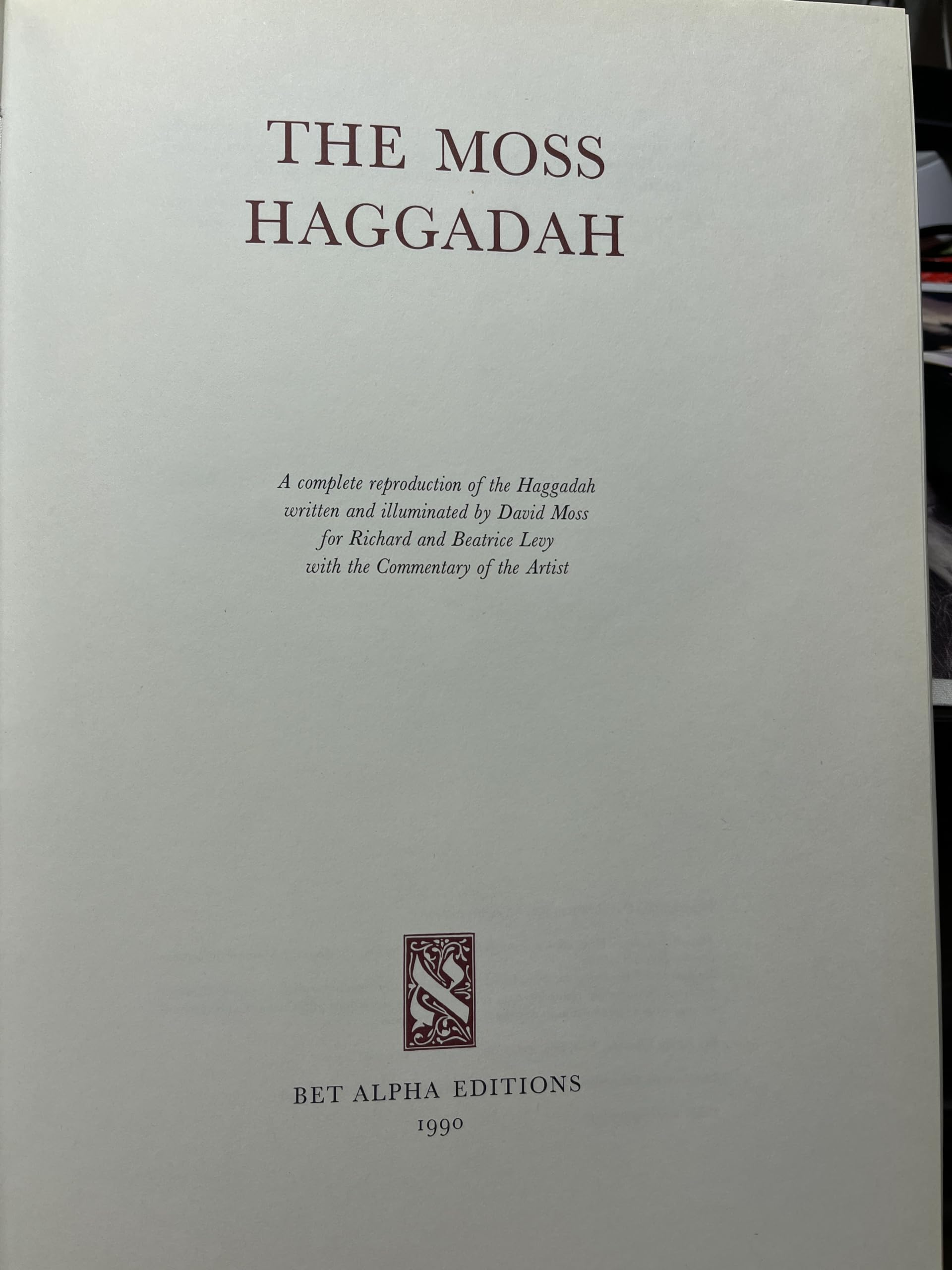 The Moss Haggadah: A complete reproduction of the Haggadah written and illuminated by David Moss for Richard and Beatrice Levy, with the commentary of the artist (Hebrew and English Edition) used book depot