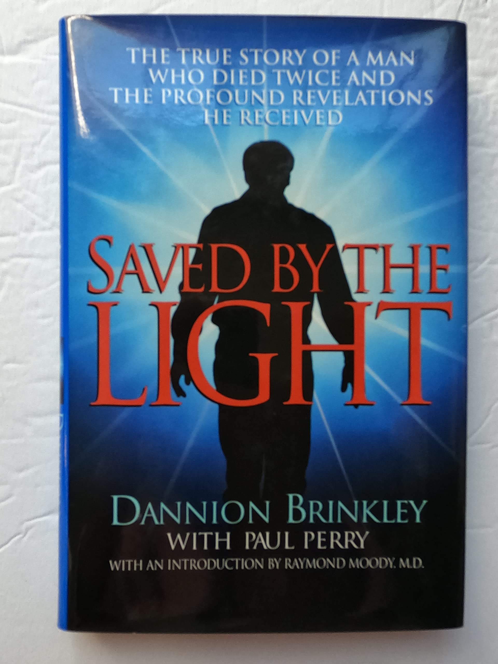 Saved by the Light: The True Story of a Man Who Died Twice and the Profound Revelations He Received used book depot