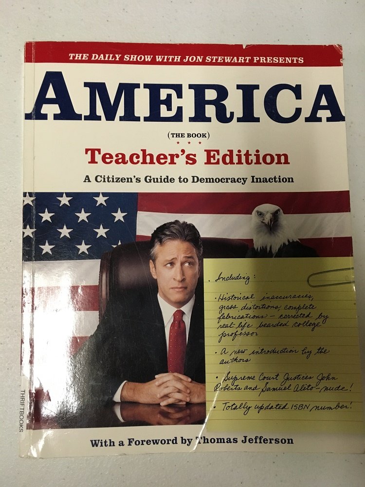 THE DAILY SHOW WITH JON STEWART PRESENTS AMERICA (THE BOOK): A Citizen's Guide to Democracy Inaction used book depot