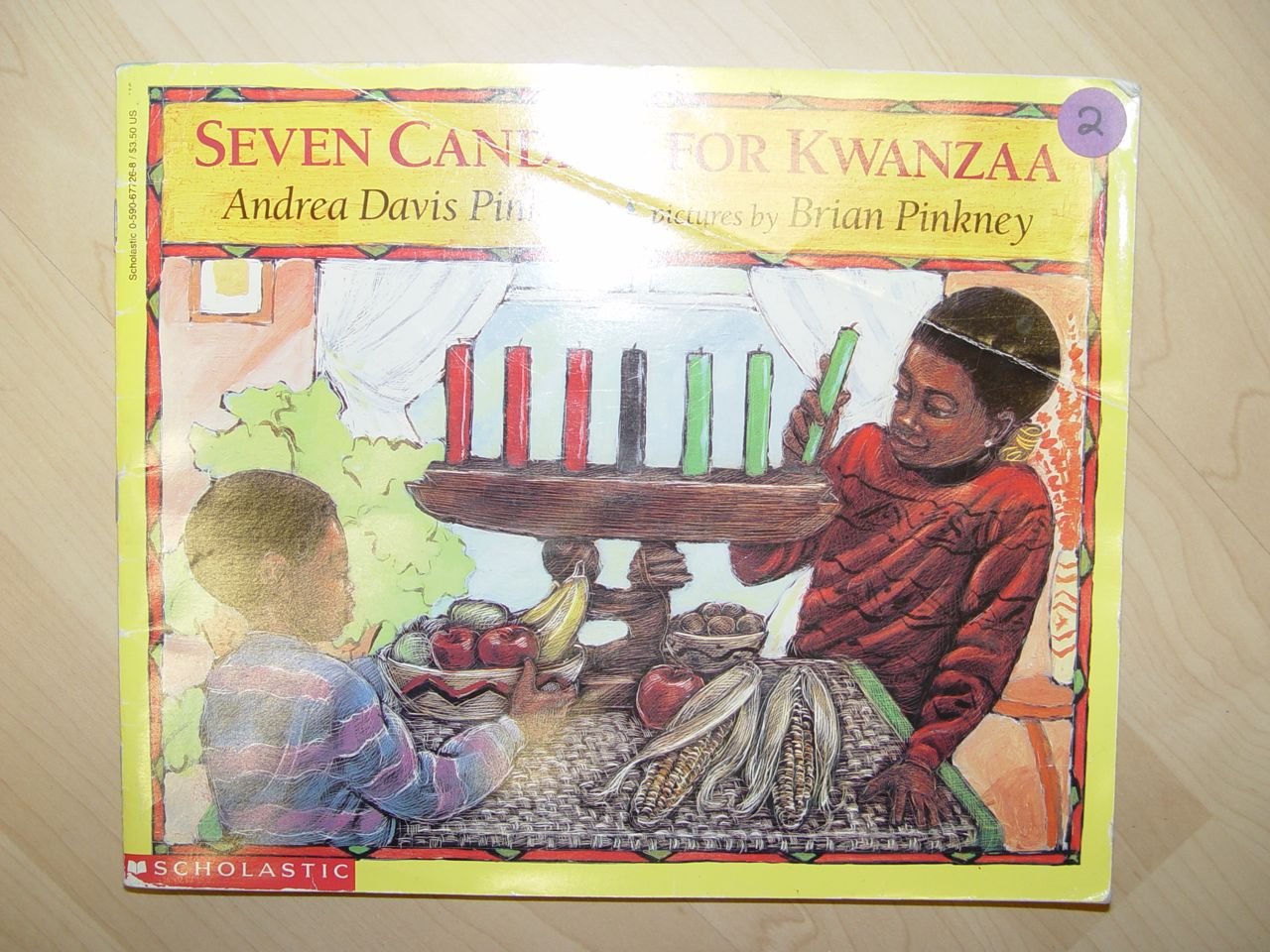 Seven Candles for Kwanzaa (First Scholastic Printing, December 1995) used book depot