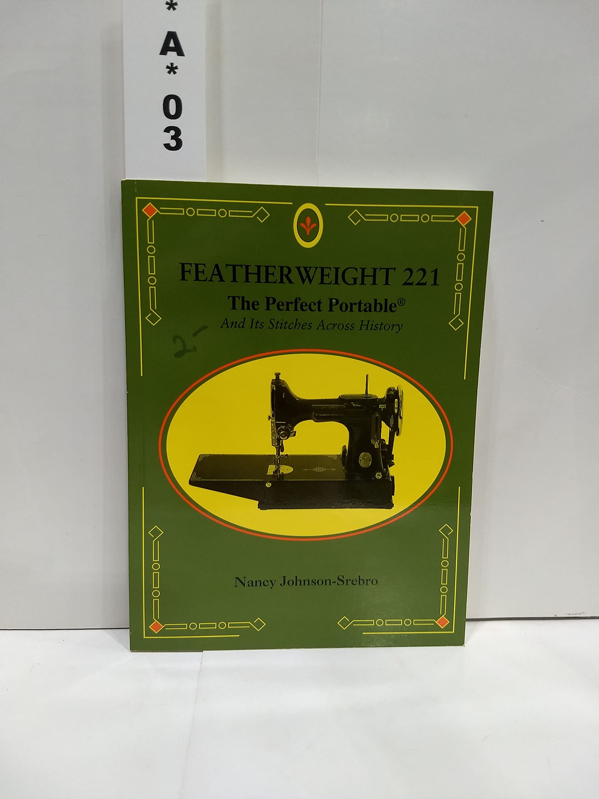 Featherweight 221 : the perfect portable : and its stitches across history used book depot