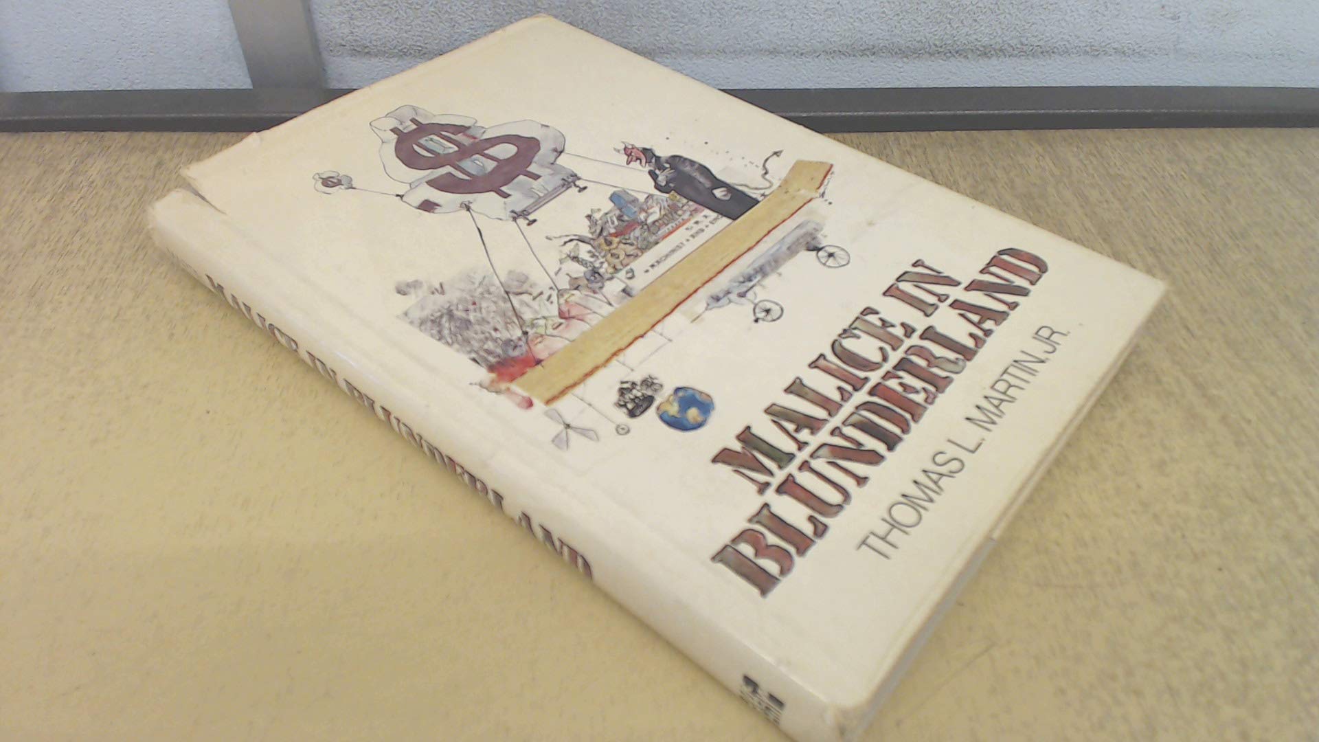 Malice in Blunderland used book depot