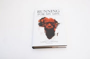 Running for My Life: One Lost Boy's Journey from the Killing Fields of Sudan to the Olympic Games used book depot