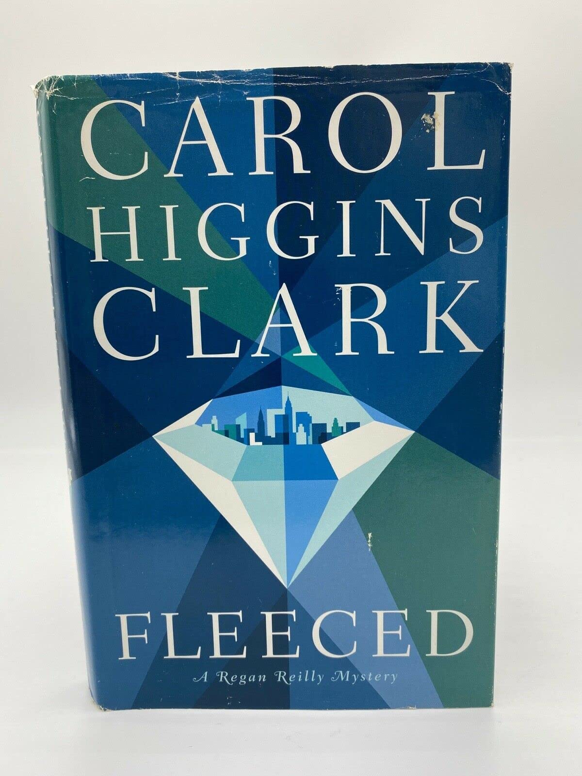Fleeced (Regan Reilly Mysteries, No. 5) used book depot