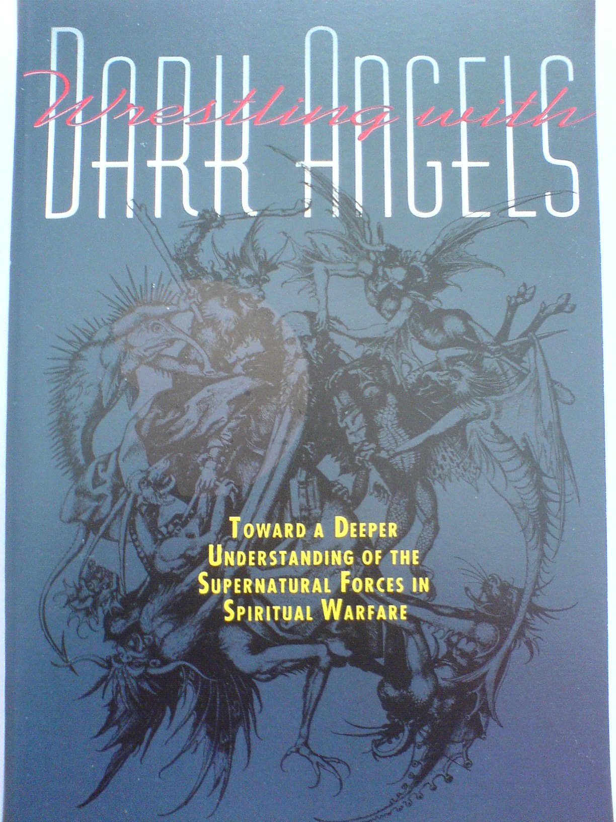 Wrestling With Dark Angels: Toward a Deeper Understanding of the Supernatural Forces in Spiritual Warfare used book depot