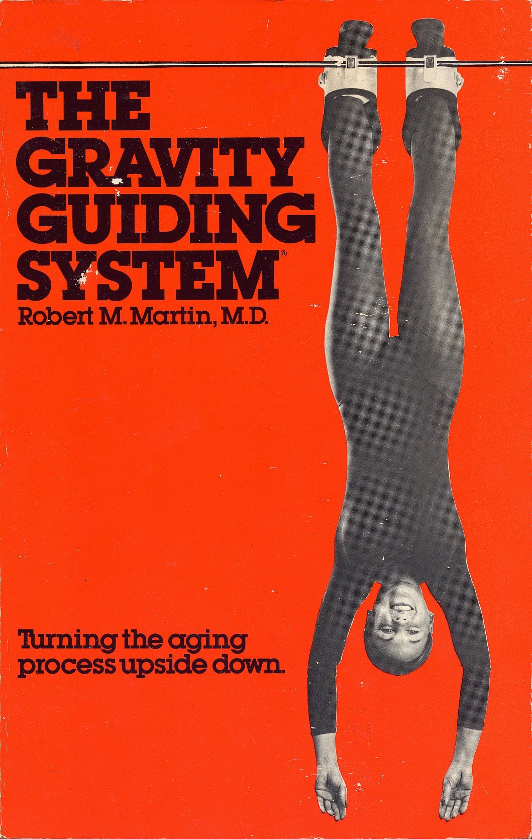 THE GRAVITY GUIDING SYSTEM - TURNING THE AGING PROCESS UPSIDE DOWN by Robert M. Martin, M.D. (1982 Softcover 1st Edition, 6th printing Gravity Guidance Inc.) used book depot