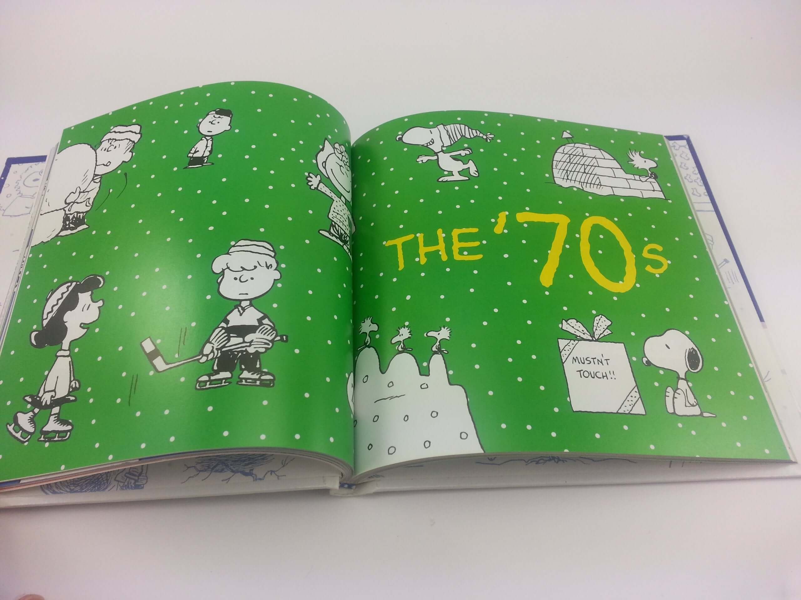 The Joy of a Peanuts Christmas: 50 Years of Holiday Comics! used book depot