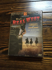 The Real West: Cowboys & Outlaws (History Channel) used book depot