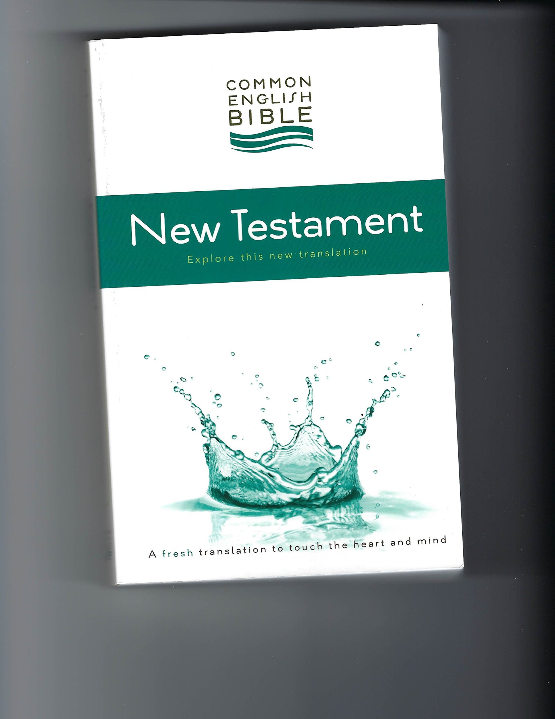 CEB Common English Bible New Testament, Softcover with splash graphic on the cover.