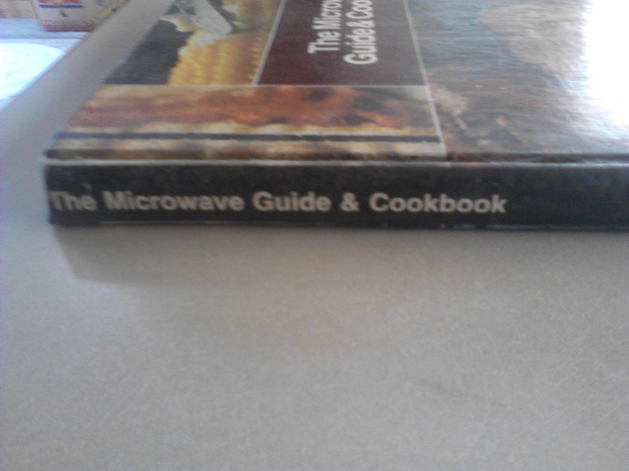 THE MICROWAVE GUIDE AND COOKBOOK - General Electric