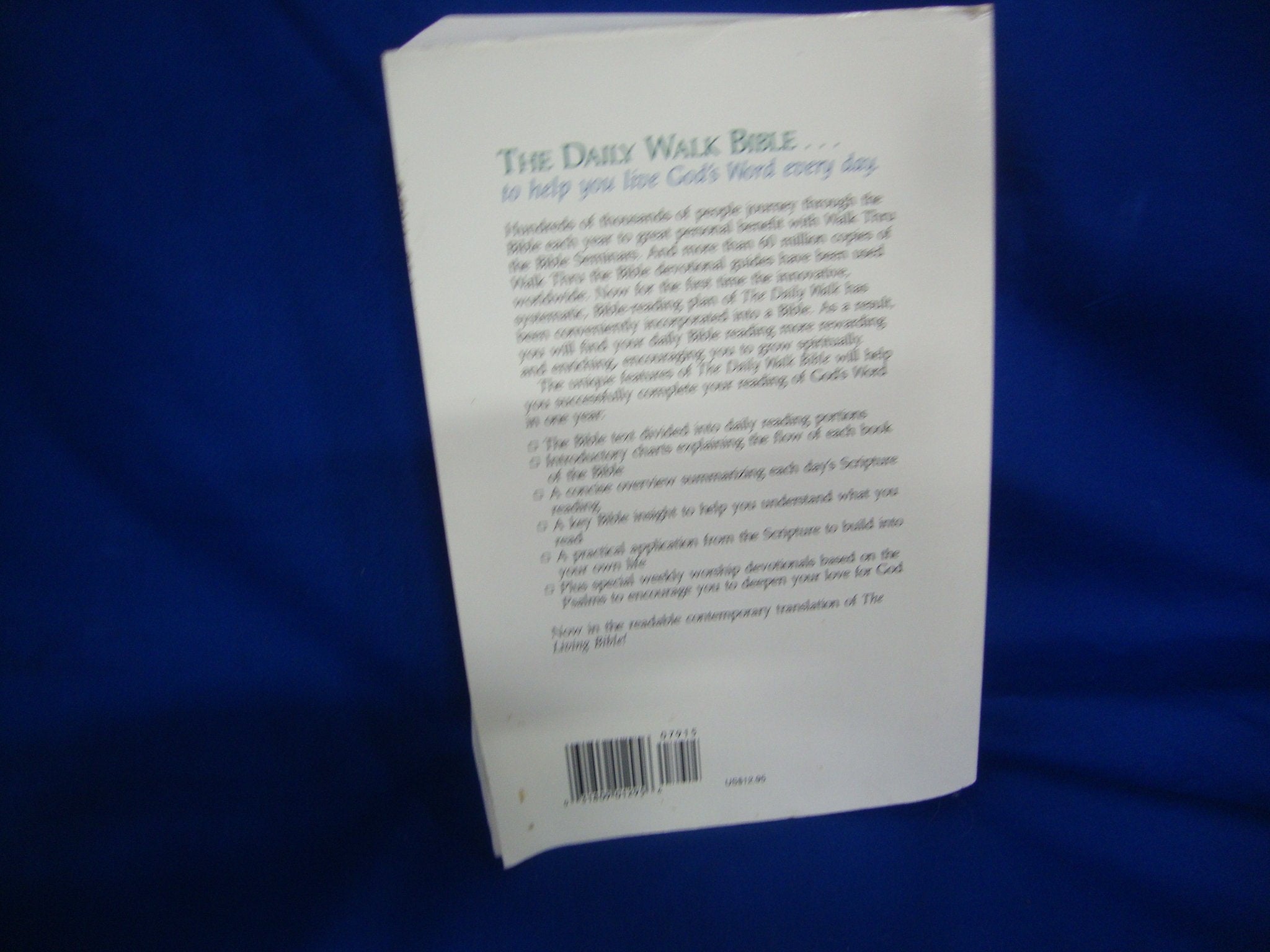 The Daily Walk Bible With 365 Devotional Helps to Guide You Through the Bible in One Year