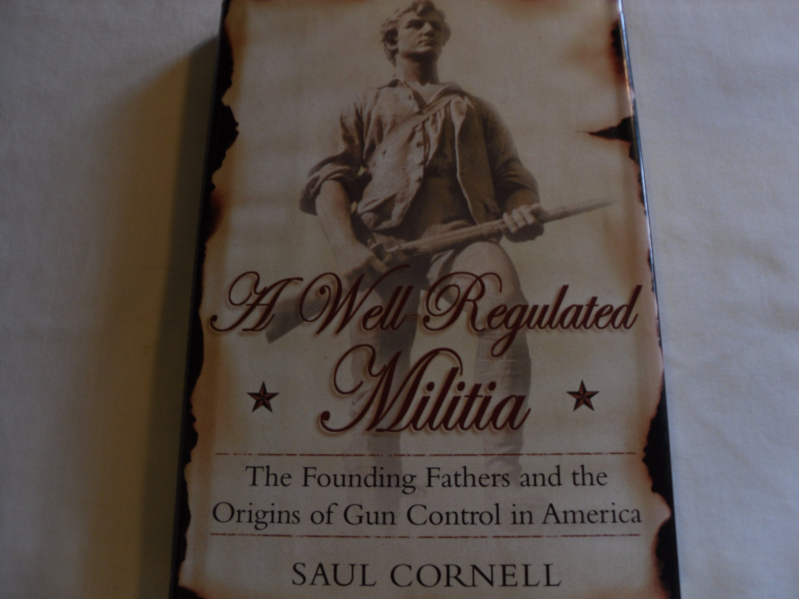 A Well-Regulated Militia: The Founding Fathers and the Origins of Gun Control in America used book depot