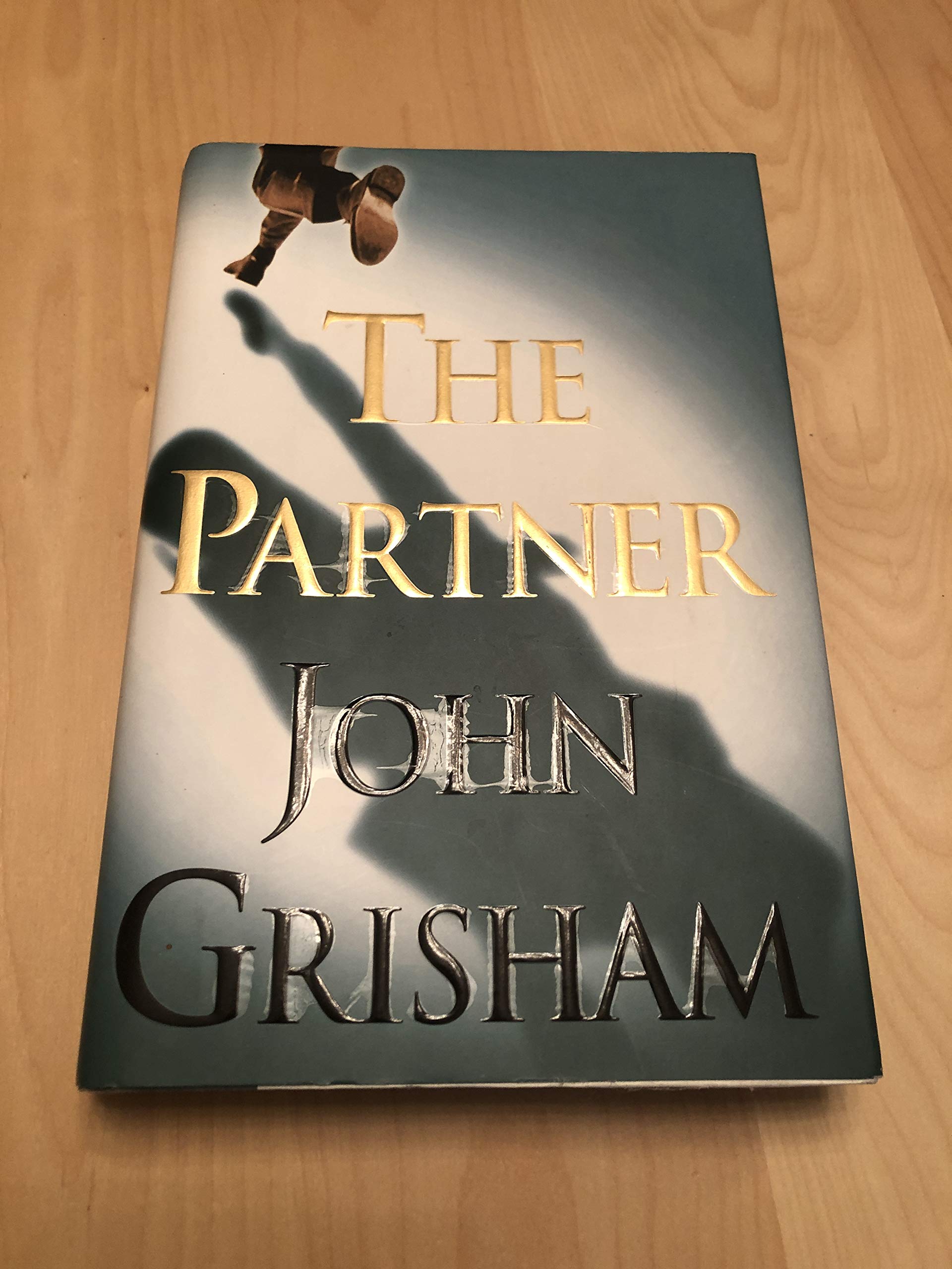 The Partner, The Runaway Jury, The Pelican Brief and Playing for Pizza (4 books) by John Grisham all First Editions! used book depot