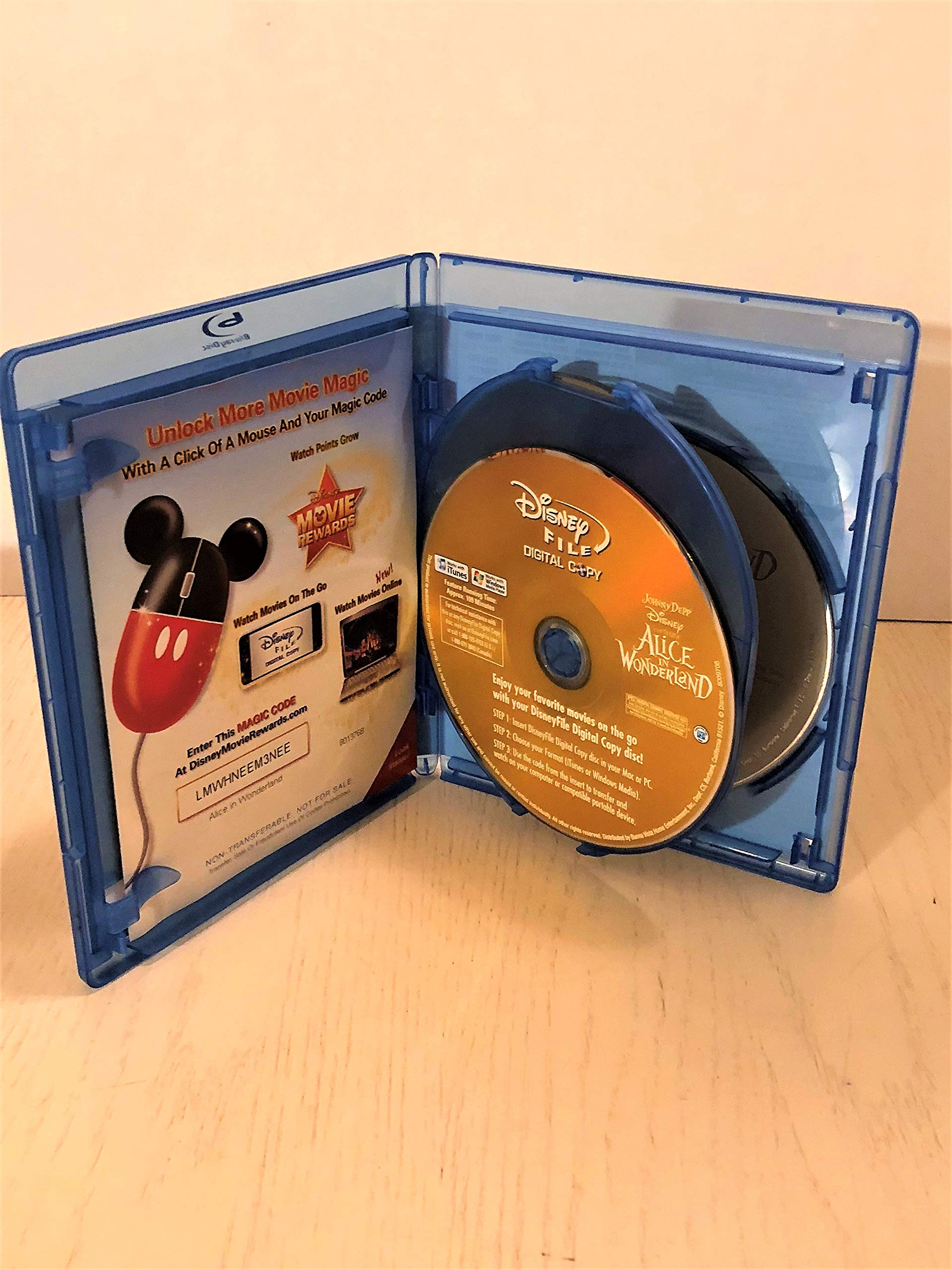 Alice in Wonderland (Three-Disc Blu-ray/DVD Combo + Digital Copy) used book depot