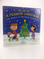 The Joy of a Peanuts Christmas: 50 Years of Holiday Comics! used book depot
