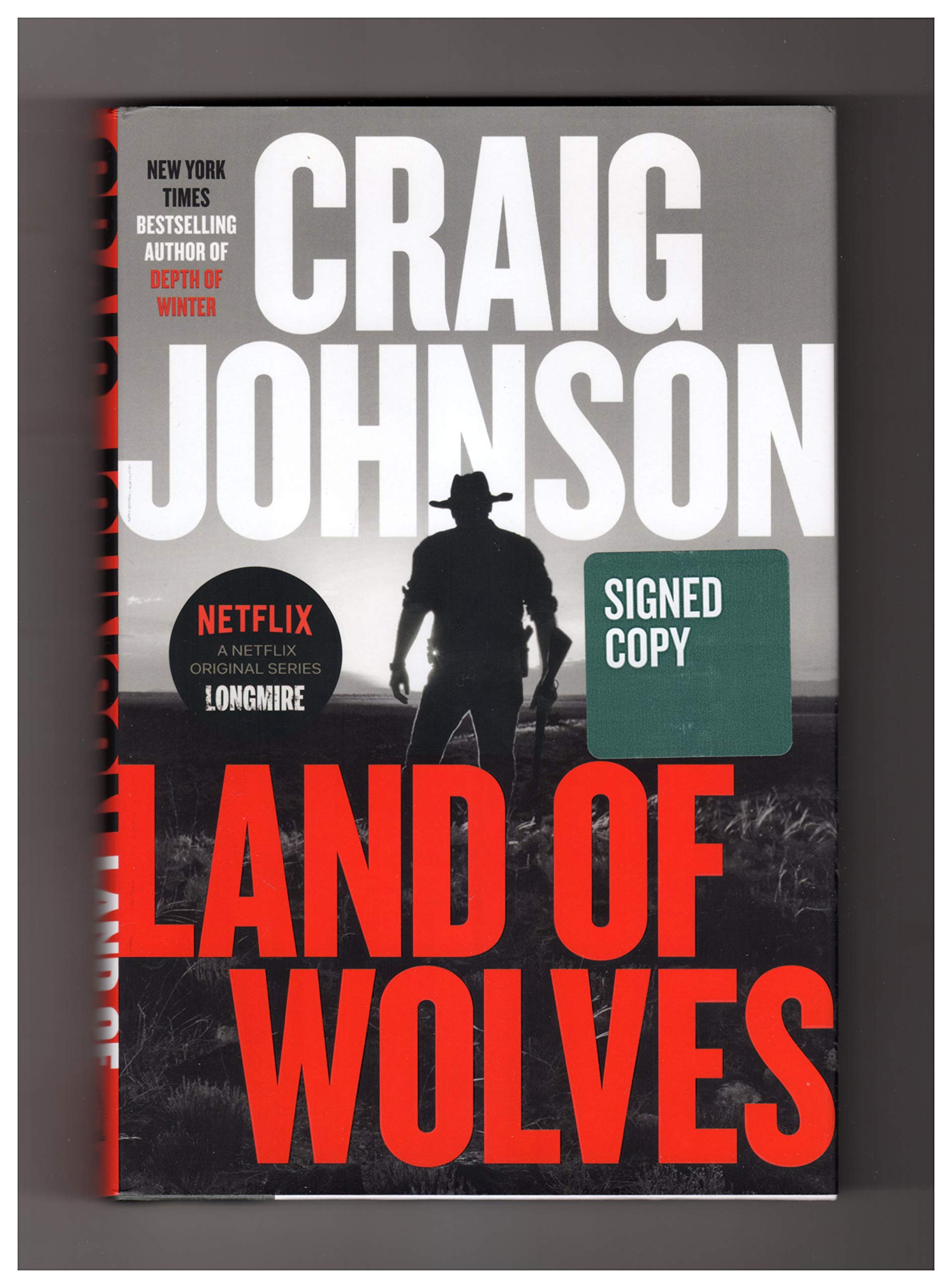 Land of Wolves / Issued- Signed Edition, also First Edition, First Printing used book depot