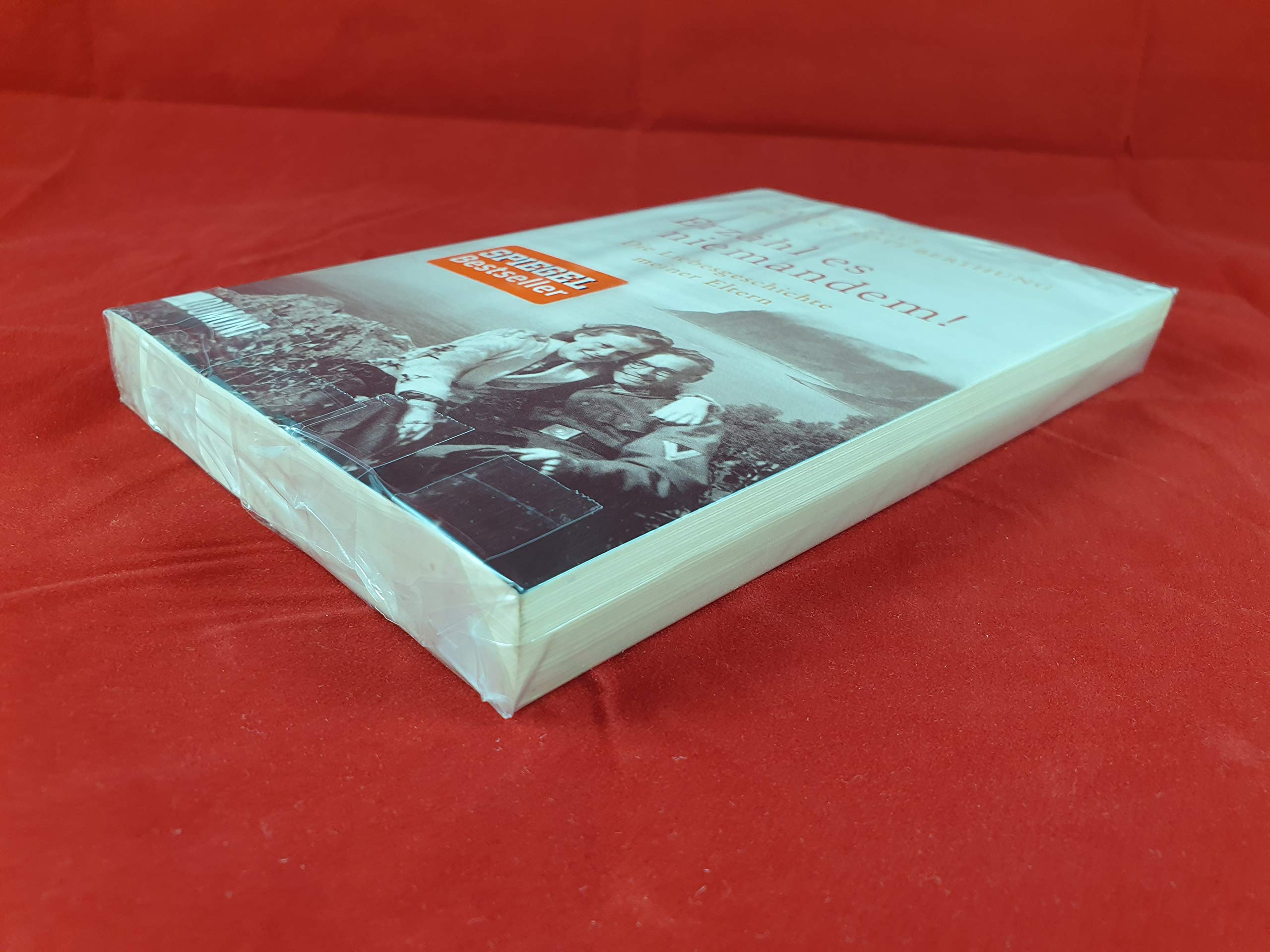 Erzähl es niemandem!: Die Liebesgeschichte meiner Eltern used book depot