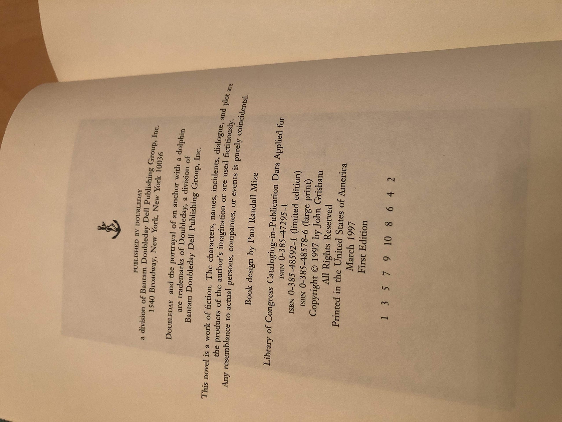 The Partner, The Runaway Jury, The Pelican Brief and Playing for Pizza (4 books) by John Grisham all First Editions! used book depot
