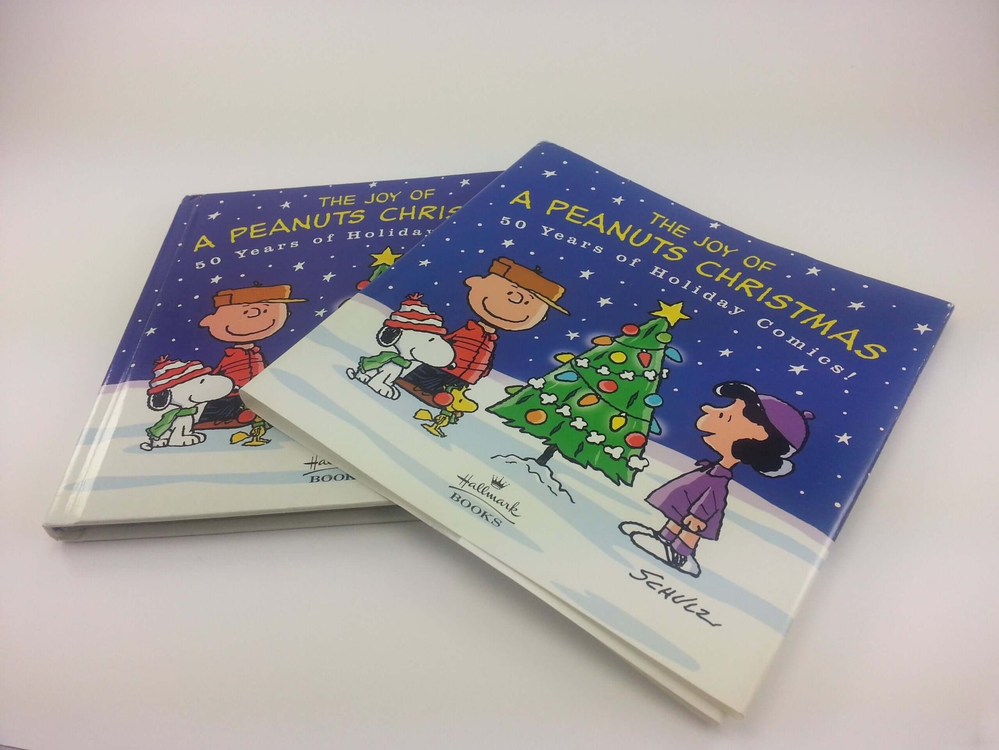 The Joy of a Peanuts Christmas: 50 Years of Holiday Comics! used book depot