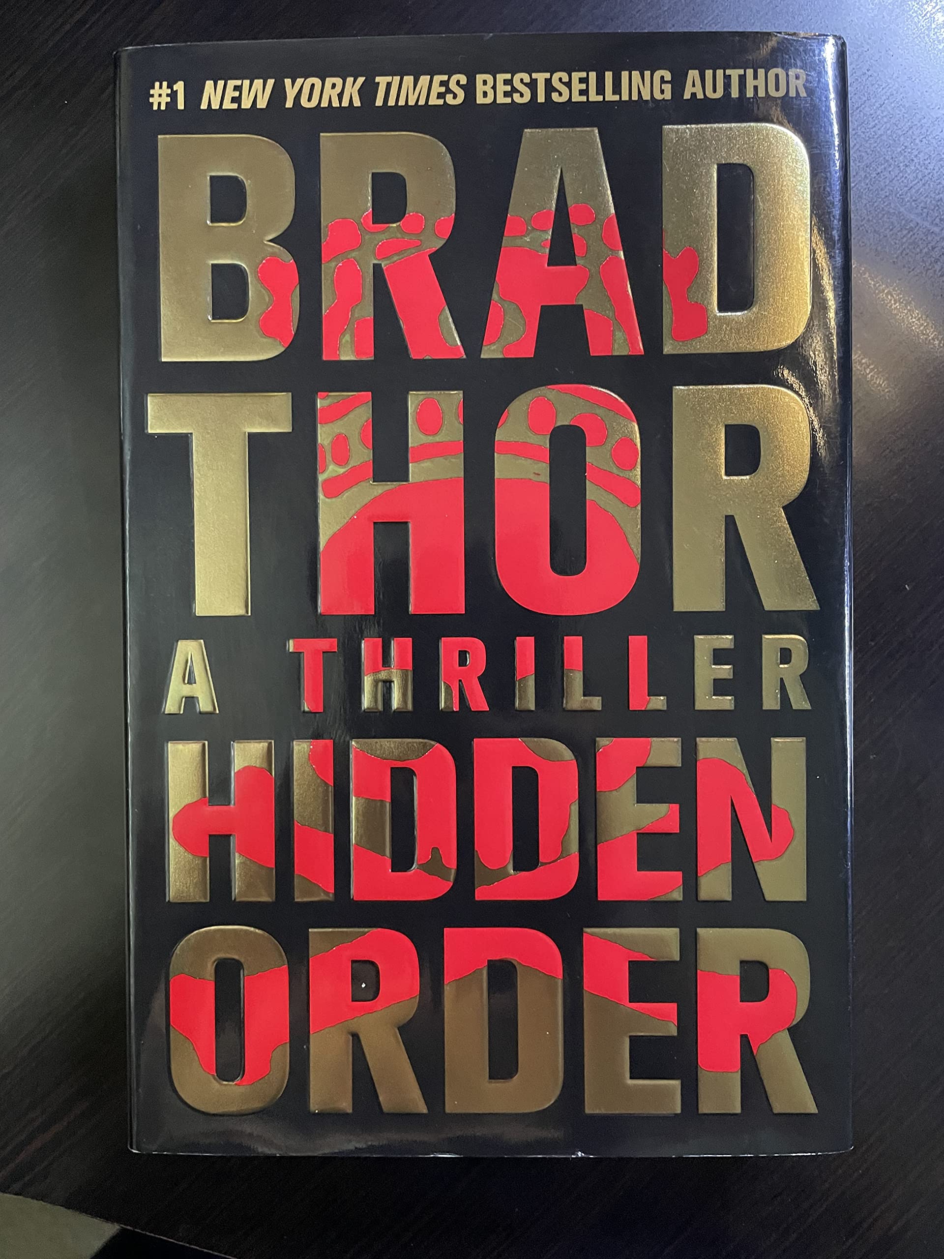 Hidden Order: A Thriller (12) (The Scot Harvath Series)