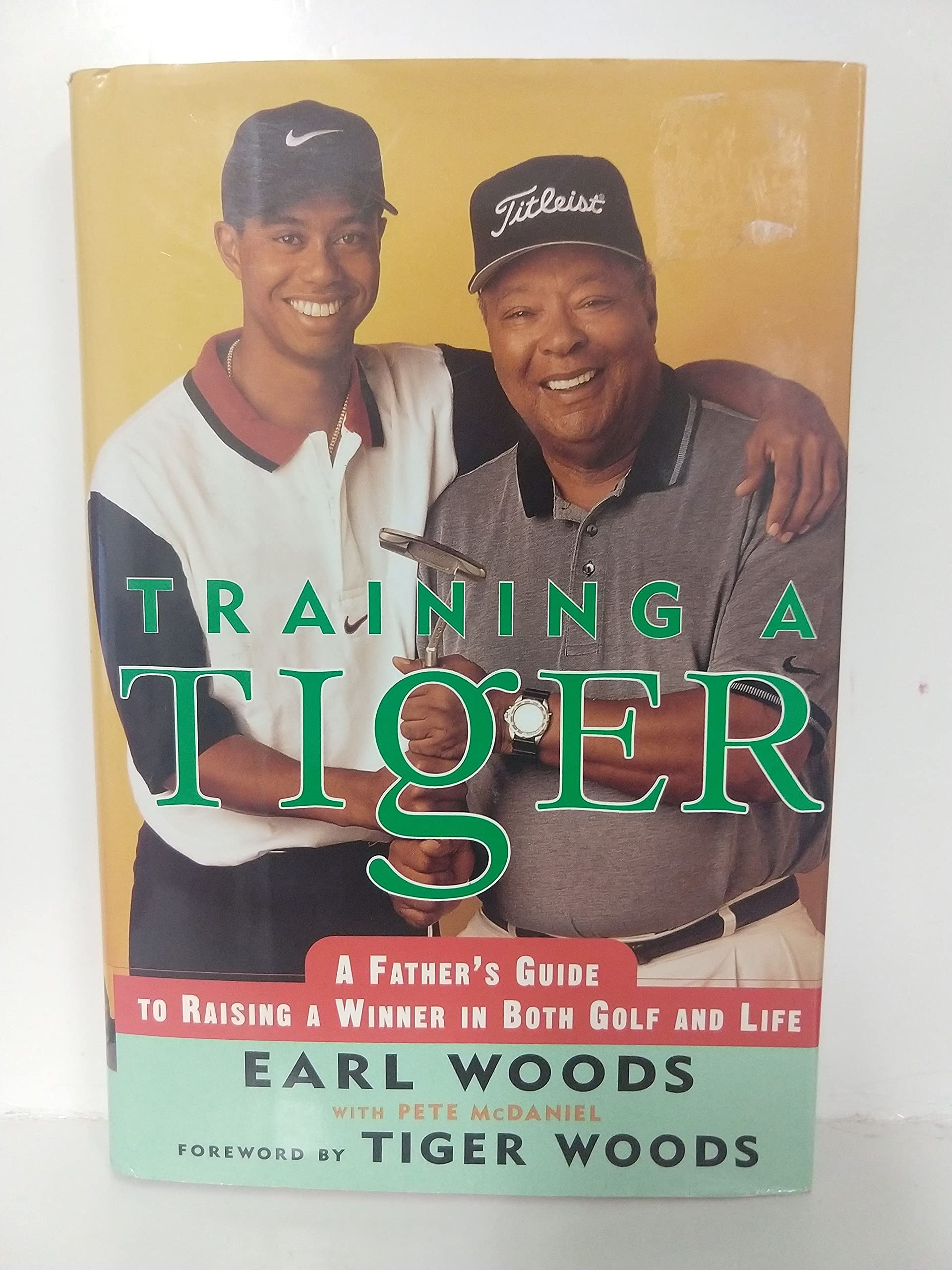 Training a Tiger: A Father's Guide to Raising a Winner in Both Golf and Life used book depot