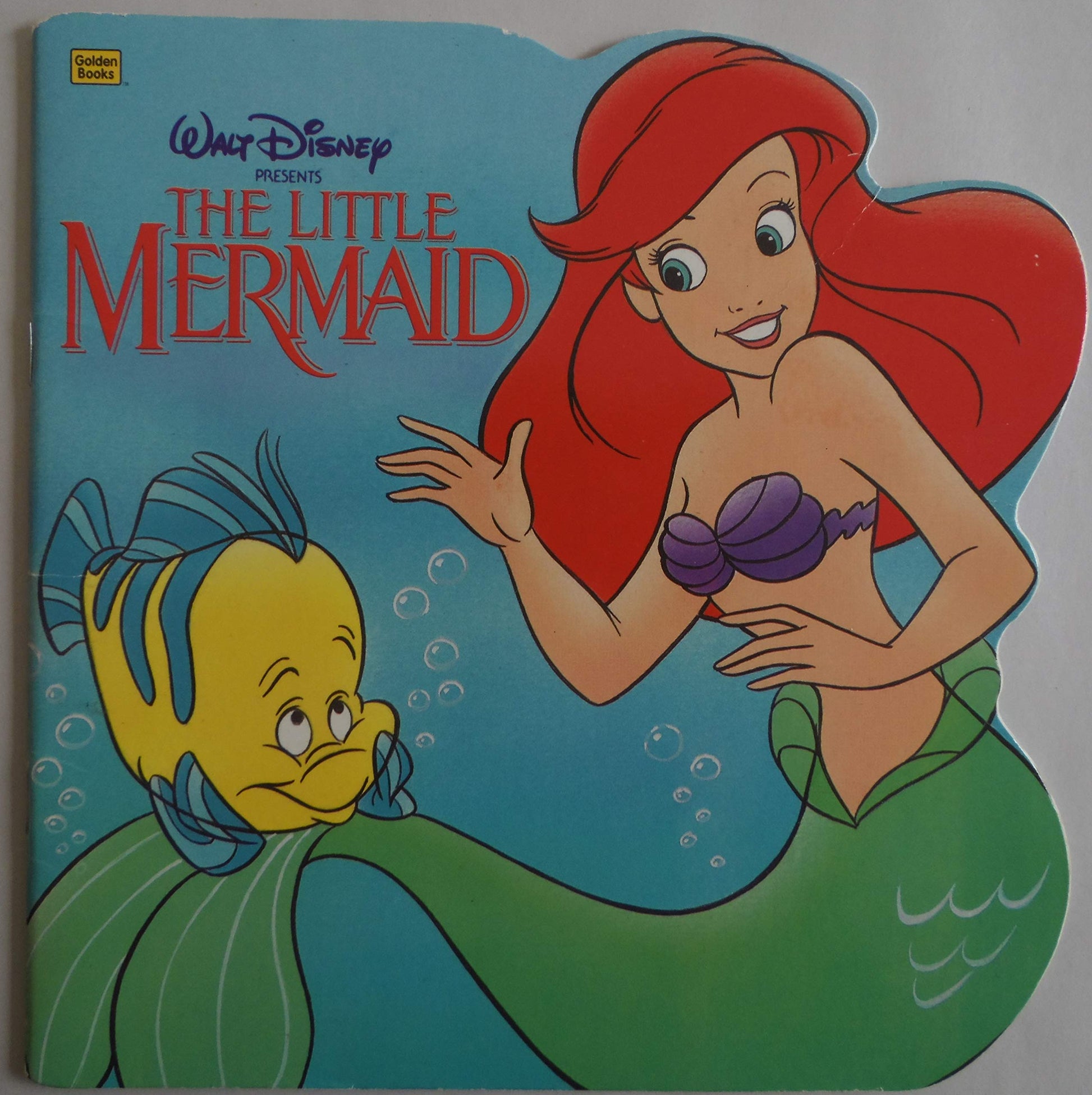 Walt Disney Pictures Presents the Little Mermaid (Golden Super Shape Books) used book depot