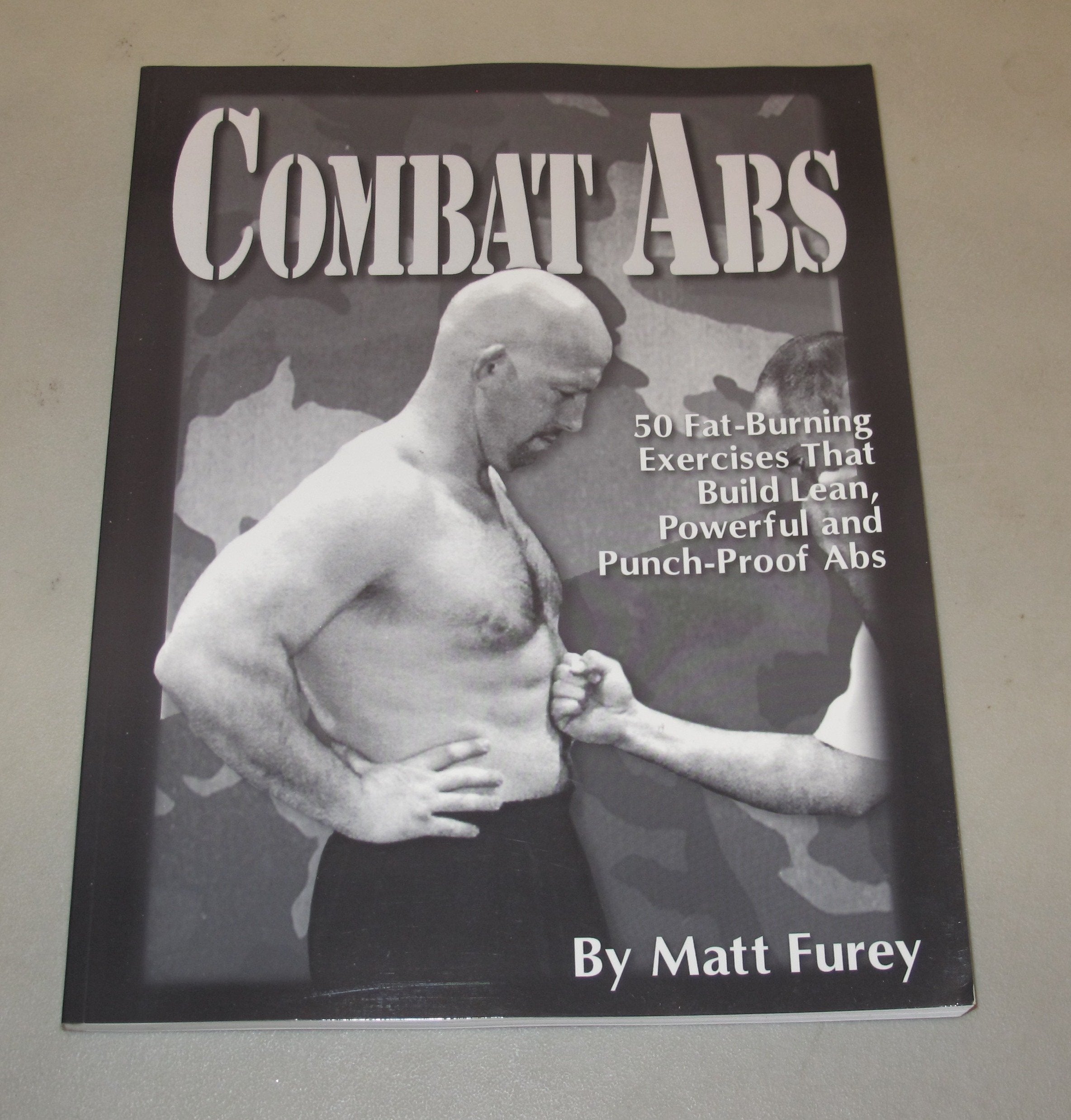 Combat Abs: 50 Fat-Burning Exercises That Build Lean, Powerful and Punch-Proof Abs used book depot