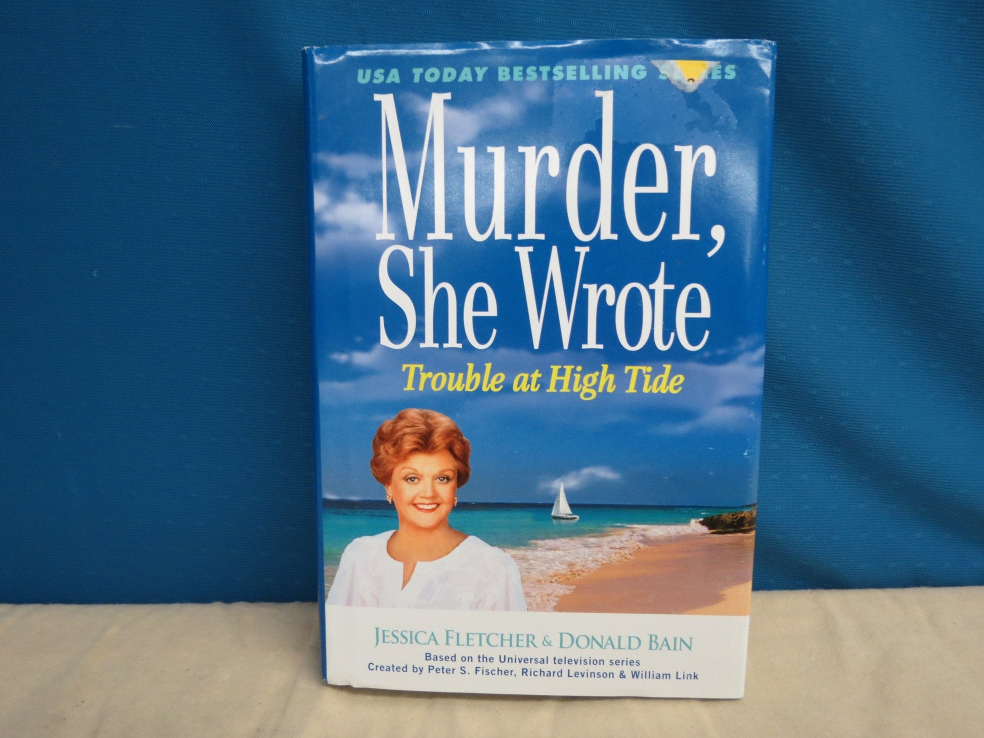 Trouble At High Tide (Murder She Wrote) used book depot