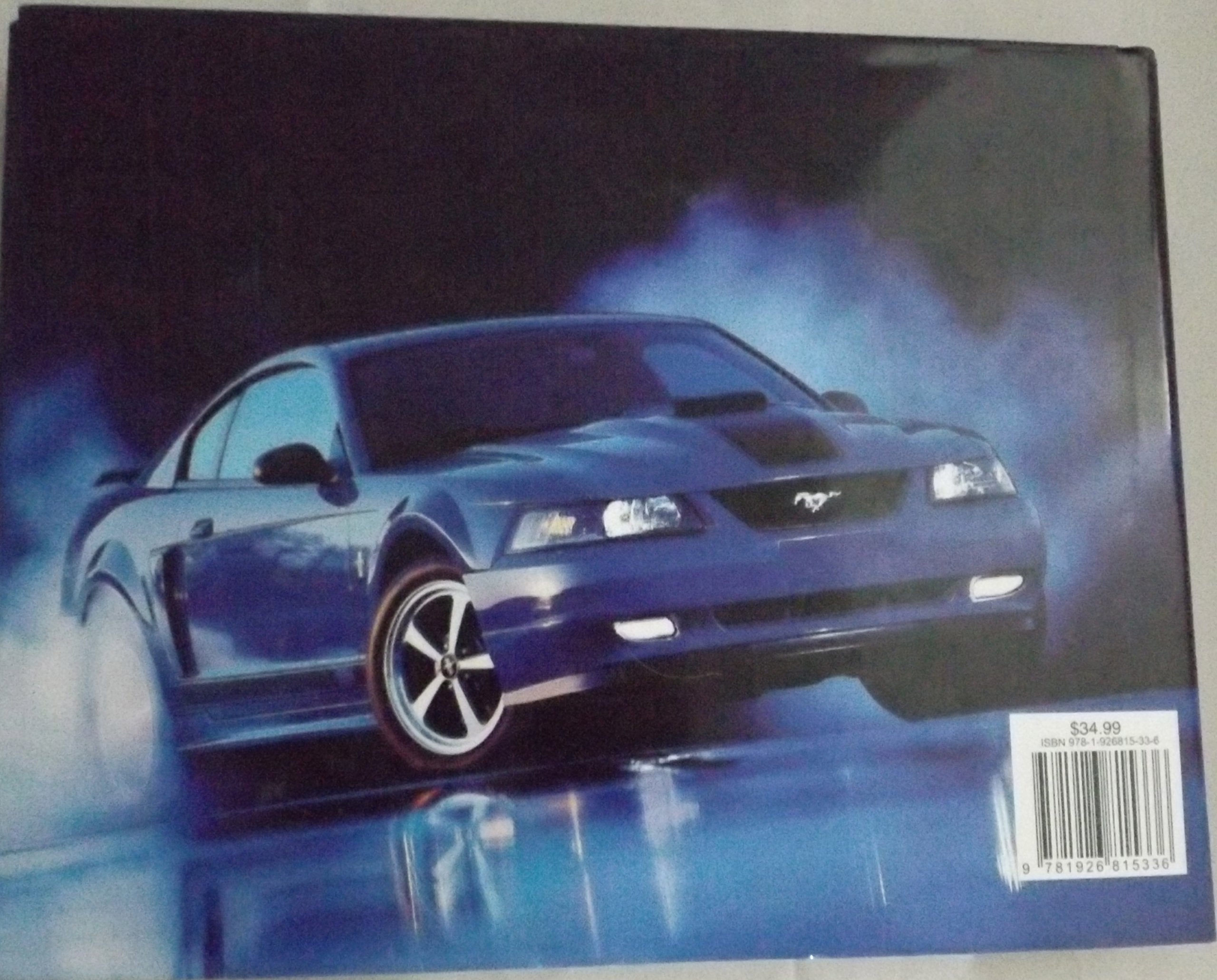 The Ultimate Guide to Muscle Cars by Glastonbury, Jim published by Chartwell Books (2010)