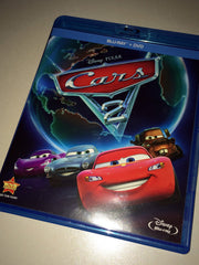 Cars 2 (Two-Disc Blu-ray / DVD Combo in Blu-ray Packaging) used book depot