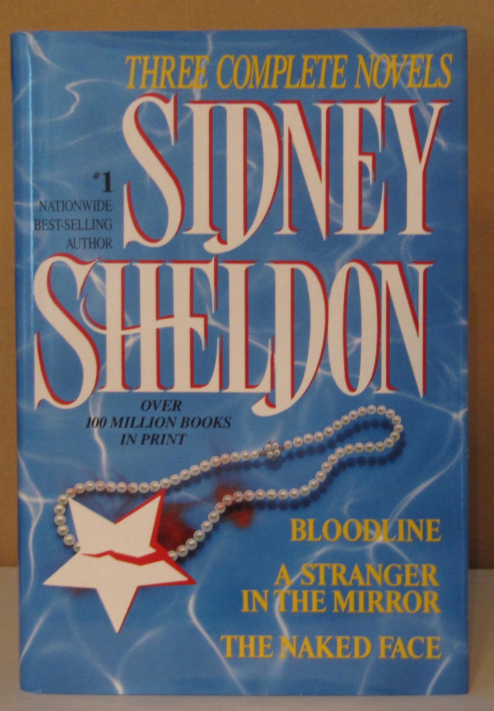 Sidney Sheldon: Three Complete Novels : Bloodline; A Stranger in the Mirror; The Naked Face used book depot
