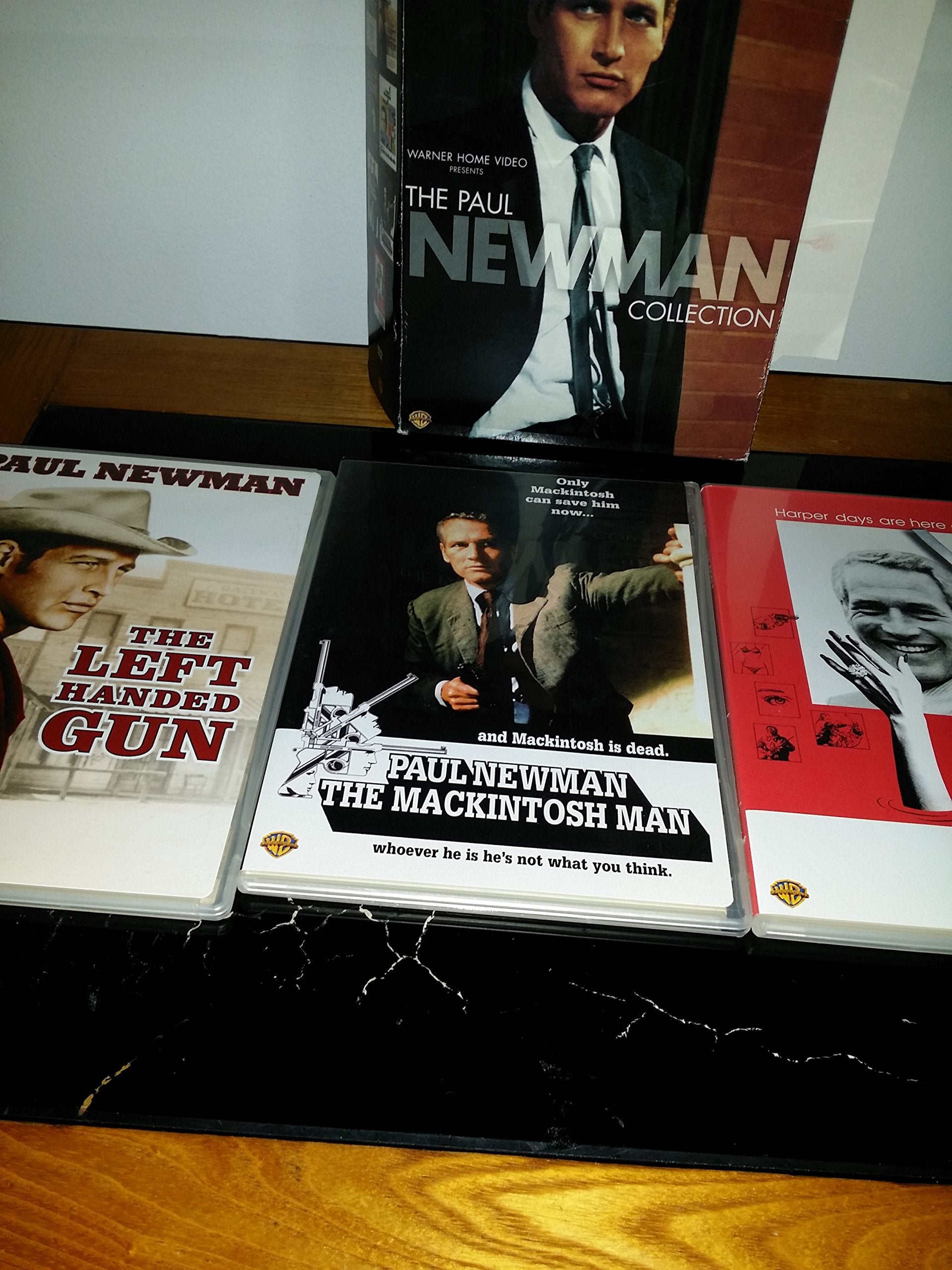 The Paul Newman Collection (Harper / The Drowning Pool / The Left-Handed Gun / The Mackintosh Man / Pocket Money / Somebody Up There Likes Me / The Young Philadelphians) used book depot