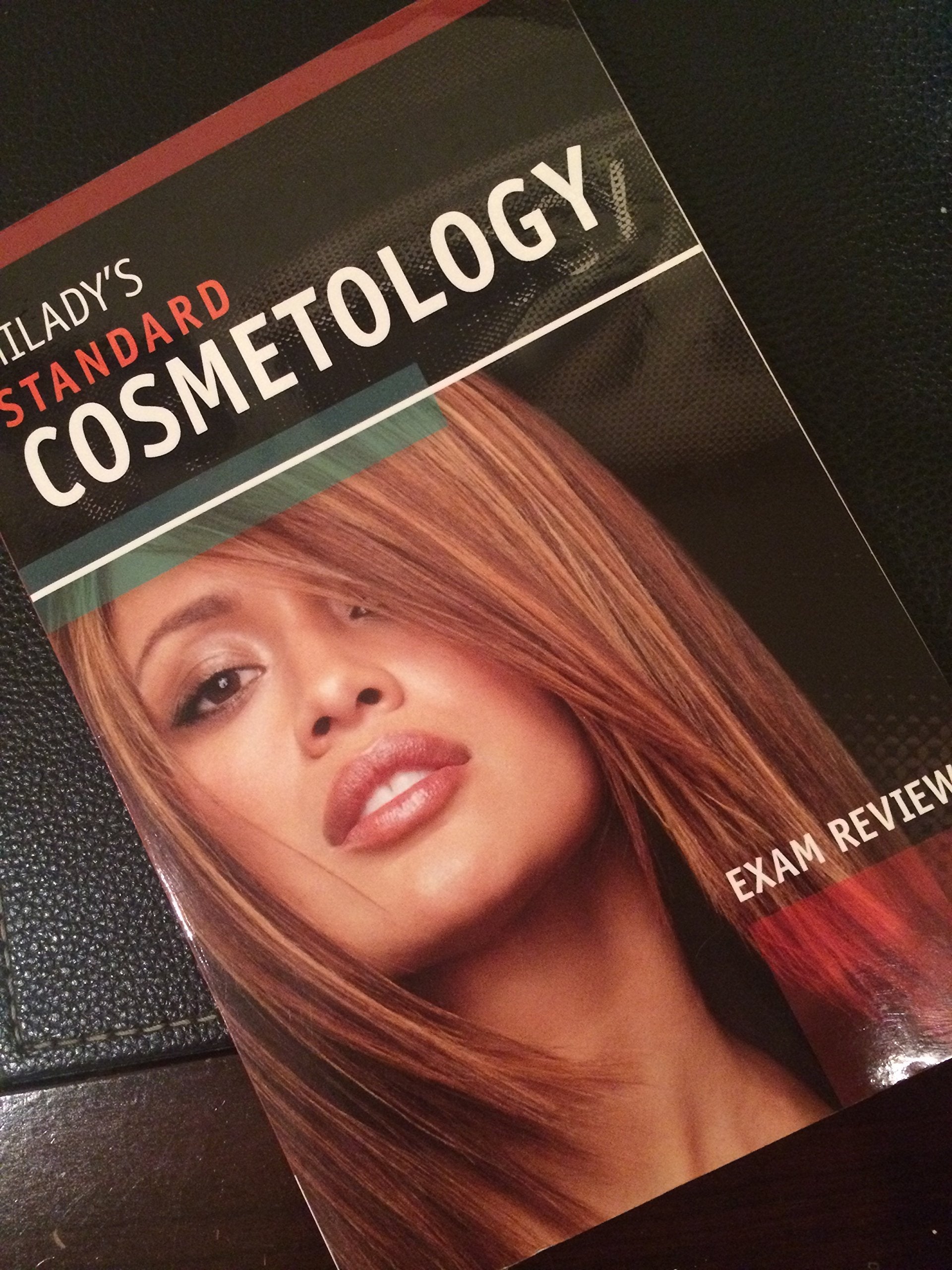Exam Review for Milady's Standard Cosmetology 2008 used book depot