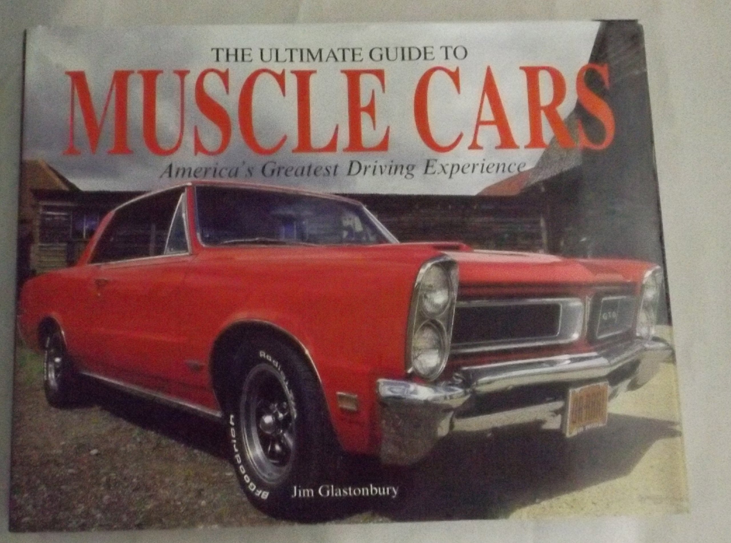 The Ultimate Guide to Muscle Cars by Glastonbury, Jim published by Chartwell Books (2010)