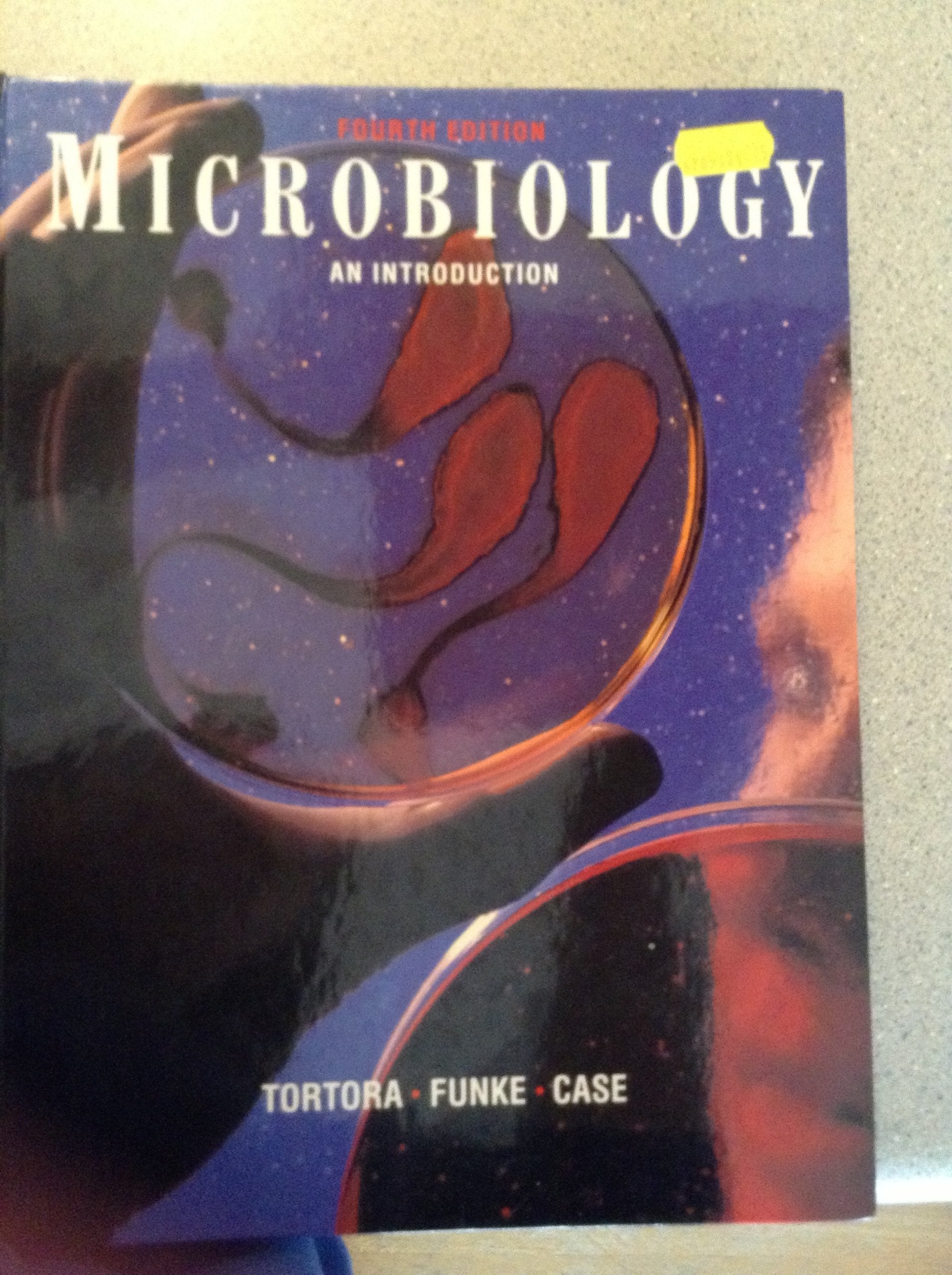 Microbiology: An introduction (The Benjamin/Cummings series in the life sciences) used book depot