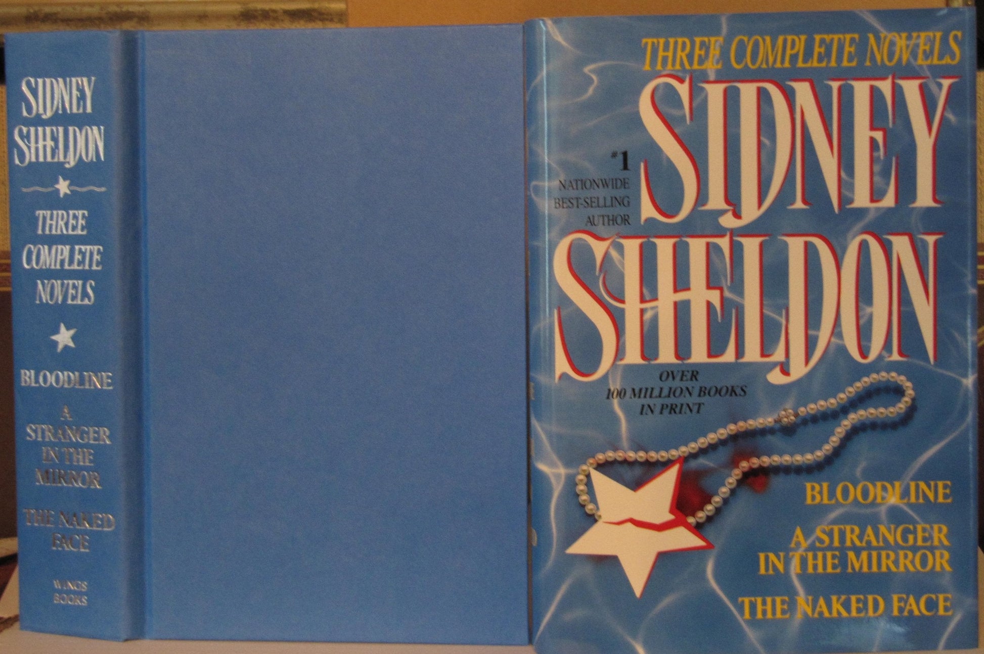 Sidney Sheldon: Three Complete Novels : Bloodline; A Stranger in the Mirror; The Naked Face used book depot