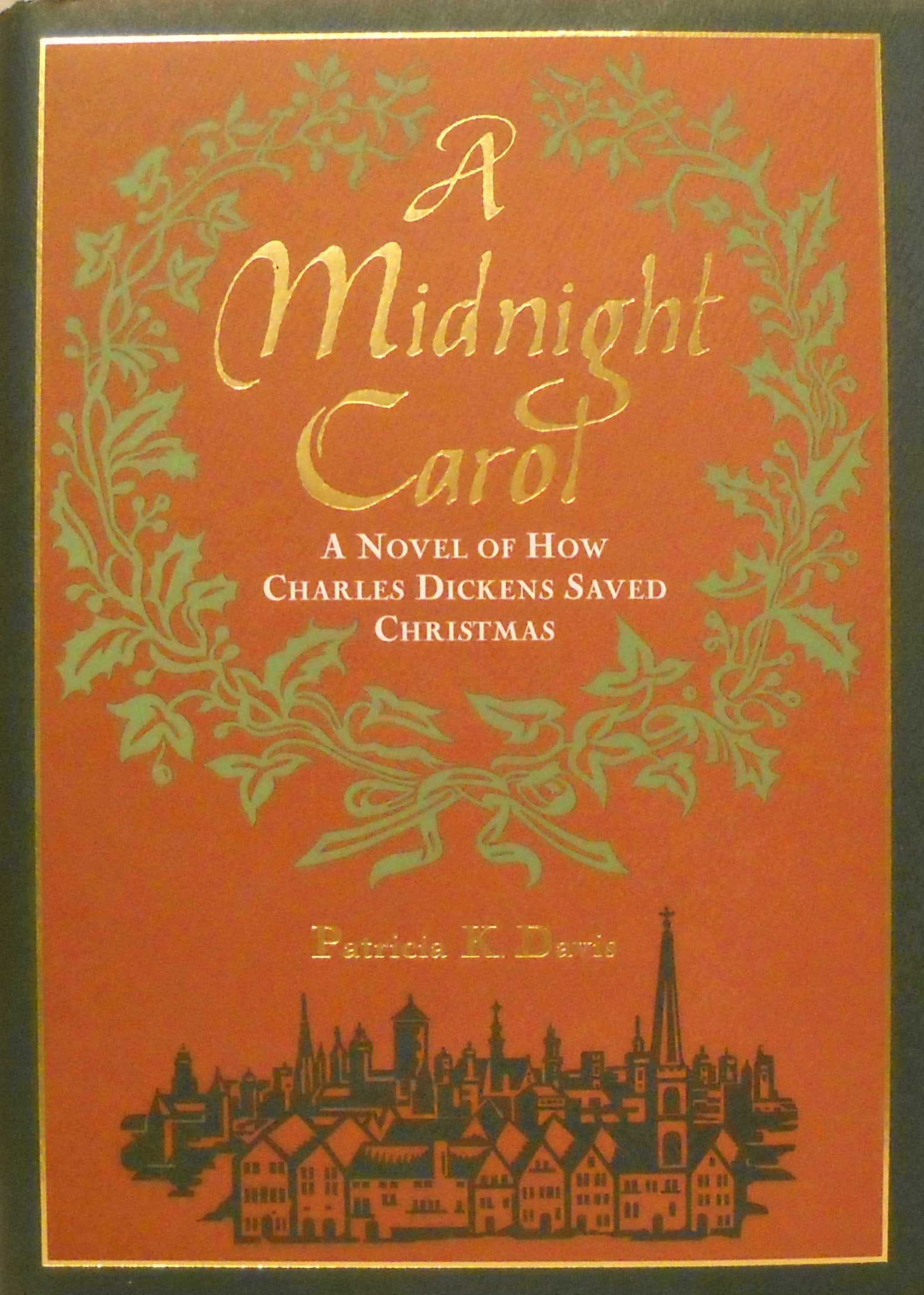 A Midnight Carol: A Novel of How Charles Dickens Saved Christmas used book depot