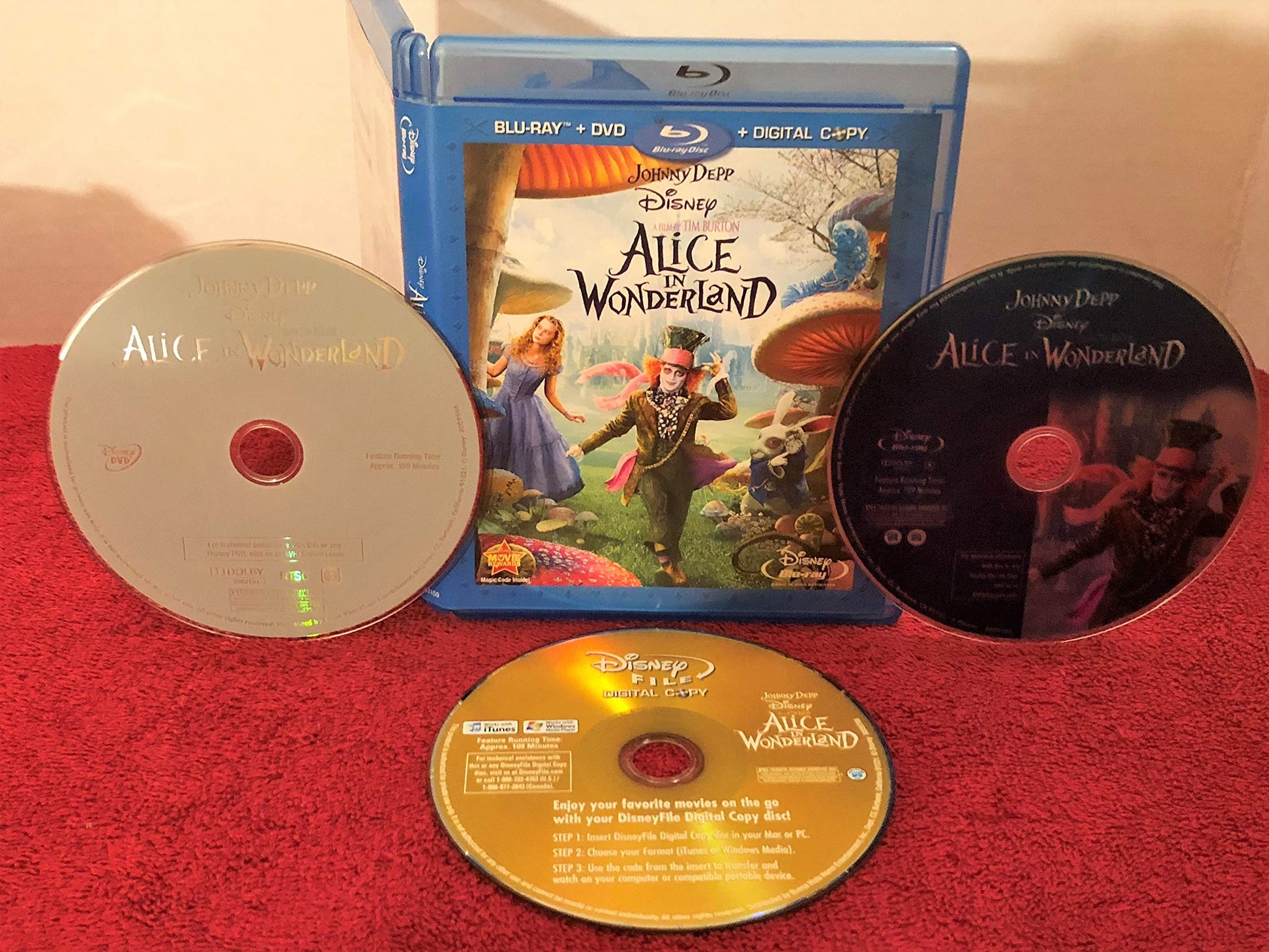 Alice in Wonderland (Three-Disc Blu-ray/DVD Combo + Digital Copy) used book depot