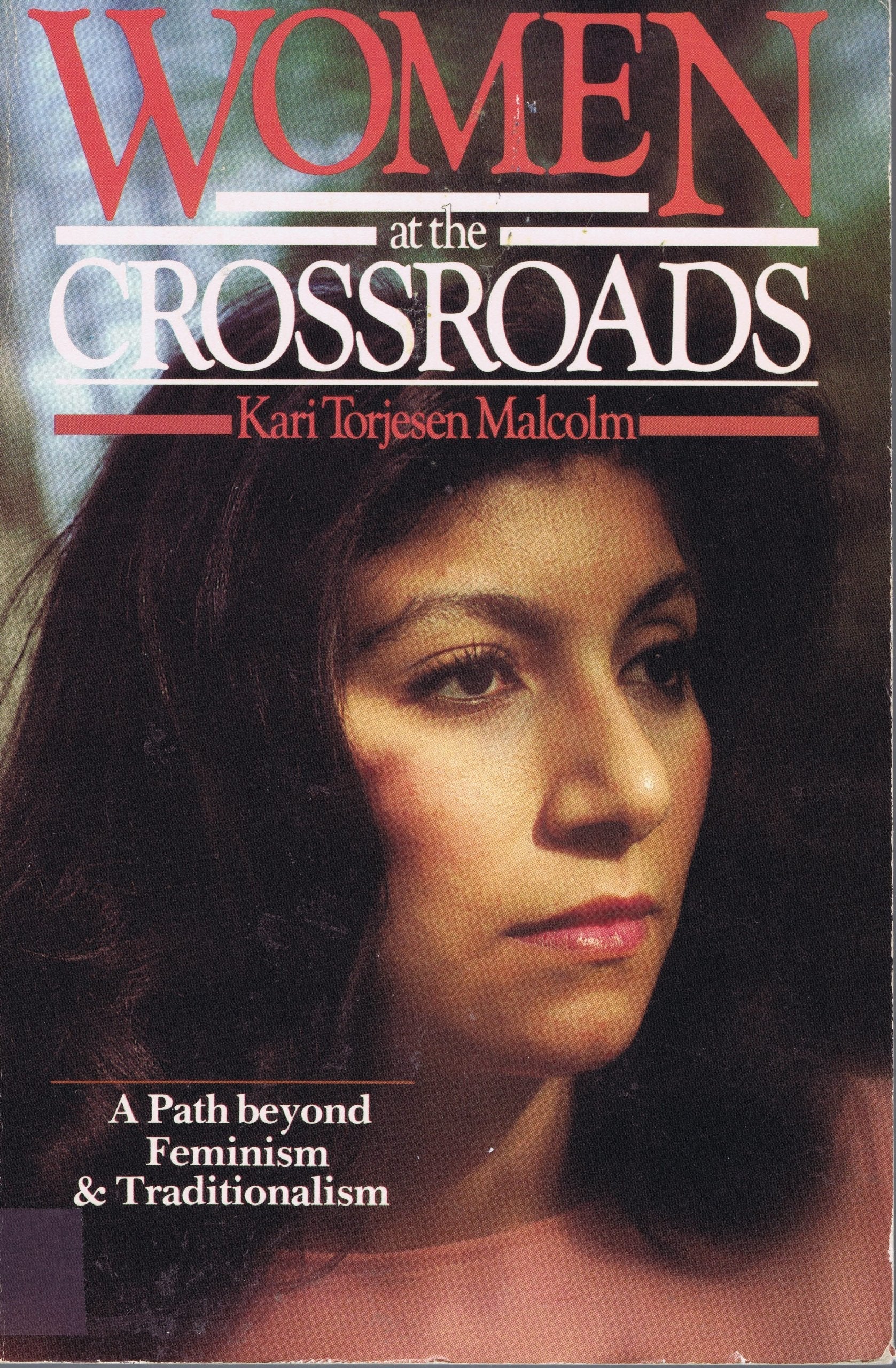 Women at the Crossroads: A Path Beyond Feminism and Traditionalism used book depot